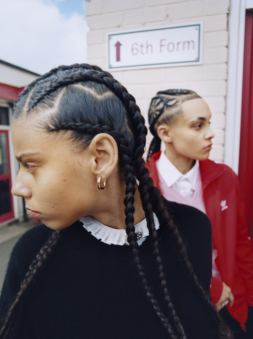 School kid on playground in uniform photographed by Bolade Banjo in i-D's The Ultra! Issue, no.369, Fall 2022