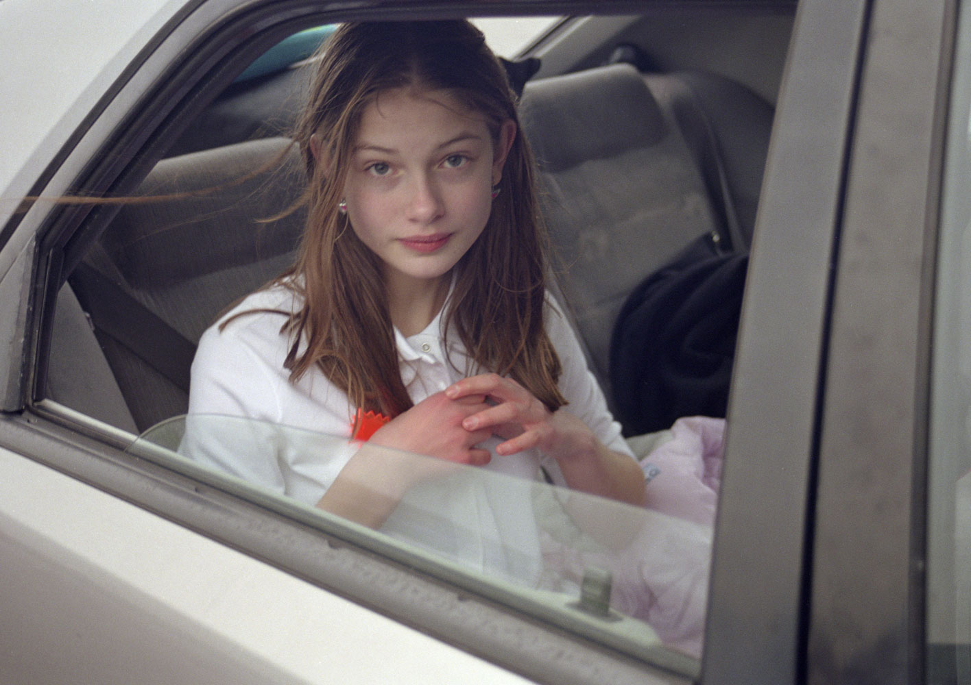 picture of sylvia by angela hill looking out of a car window