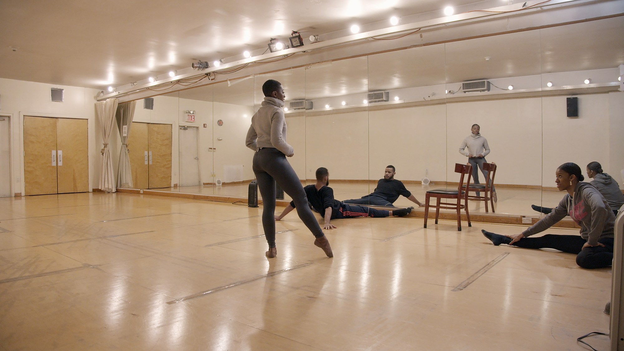 Rod Rodgers Dance Company dancers practicing in the studo.