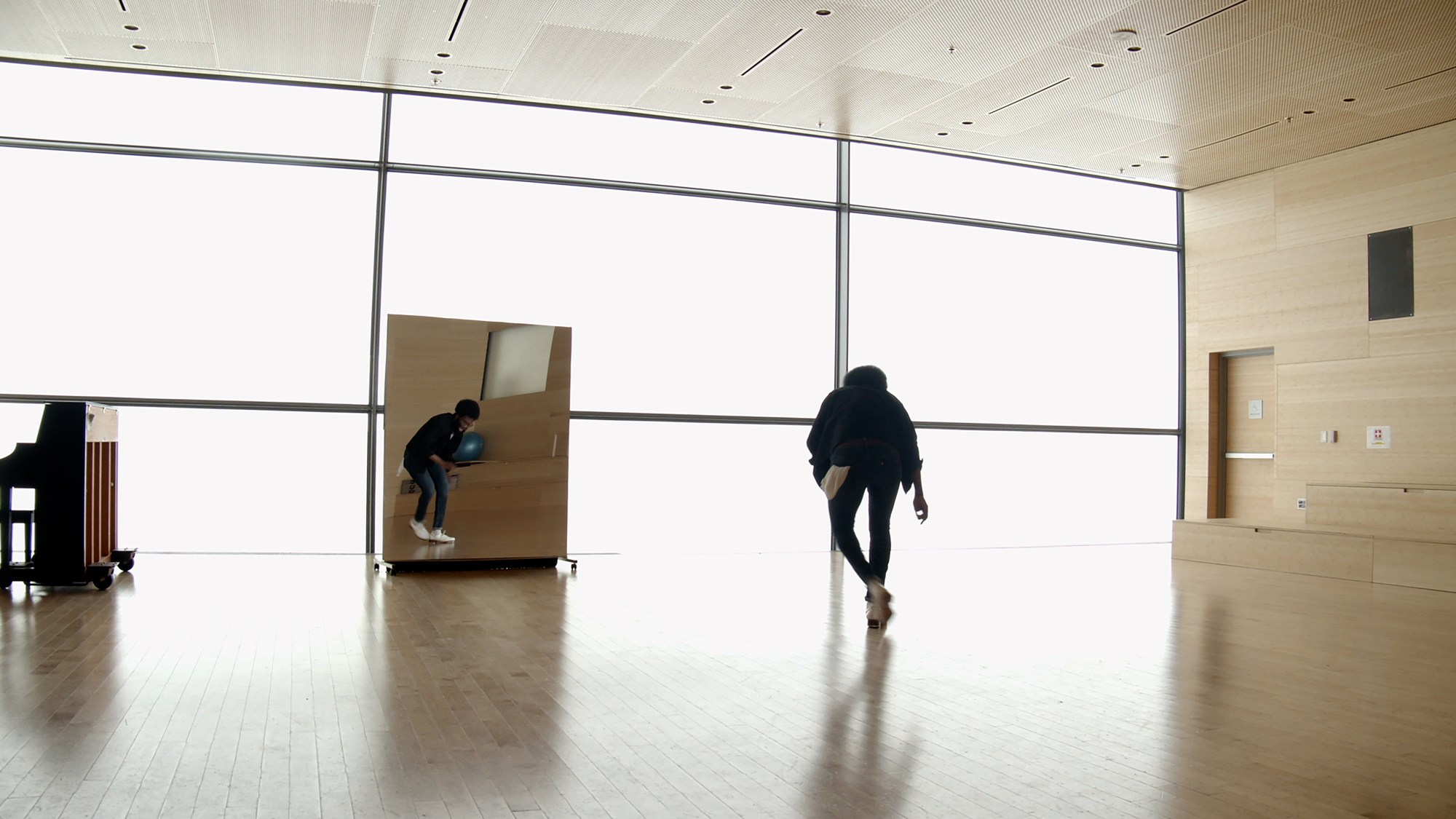 Michael Love dancing in a bright studio.