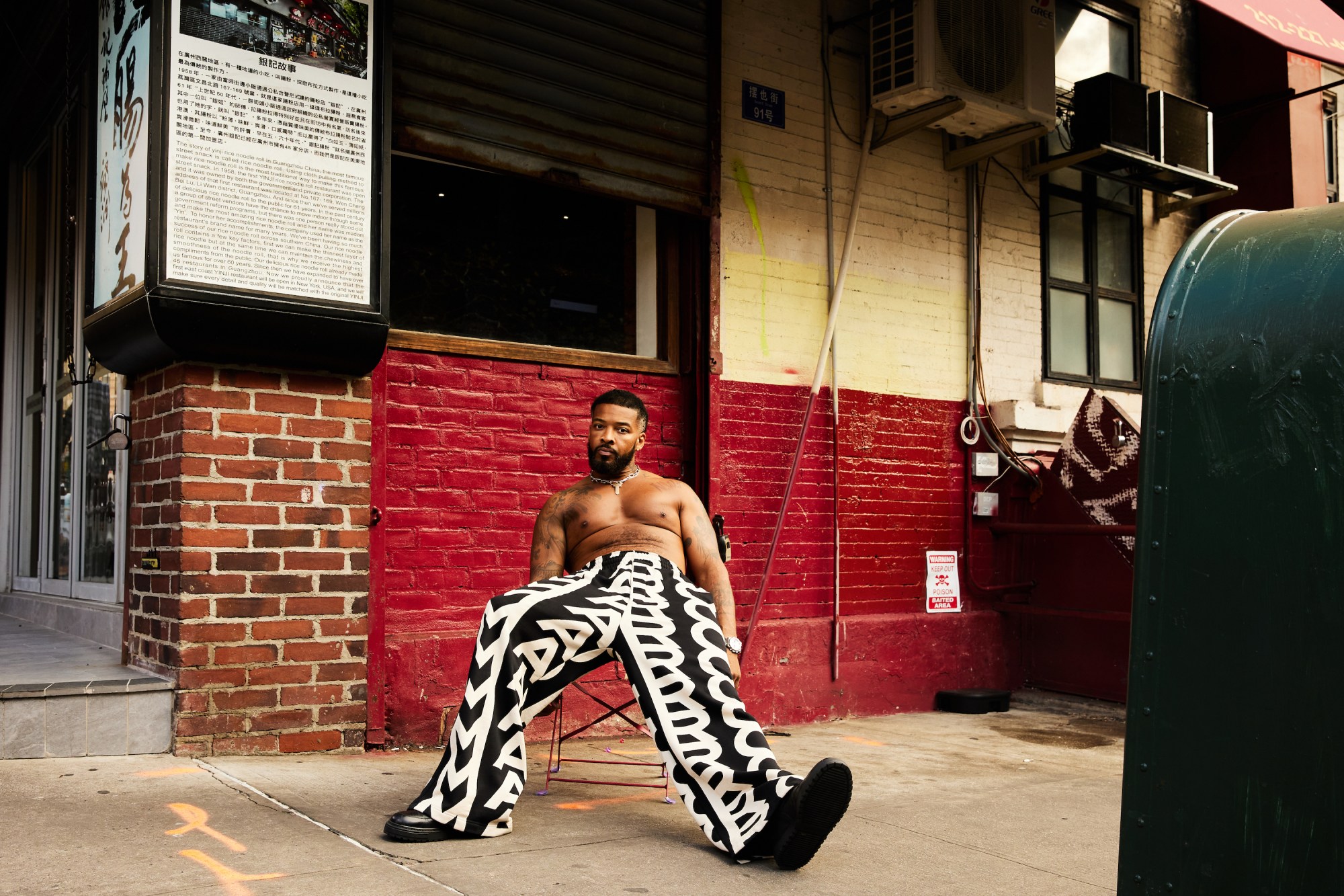 Lester Walker posing at Dr. Clark's wearing Marc Jacobs Monogram Collection