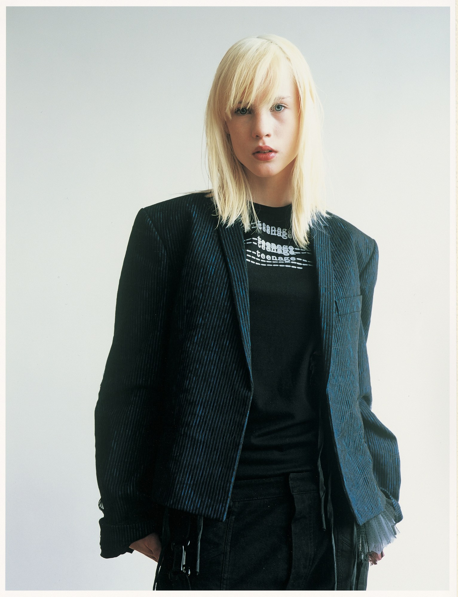 Photo of a girl in a tee and a blazer in the Raf Simons guest edited issue of I-D the inspiration issue, February 2001