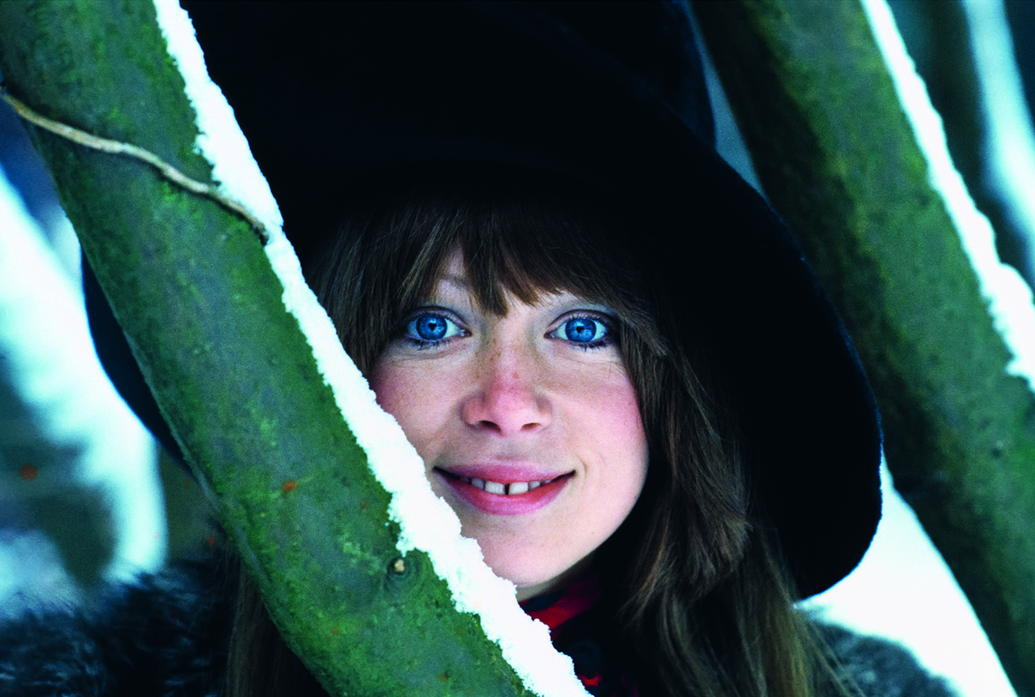 patti boyd smiling through snowy plants