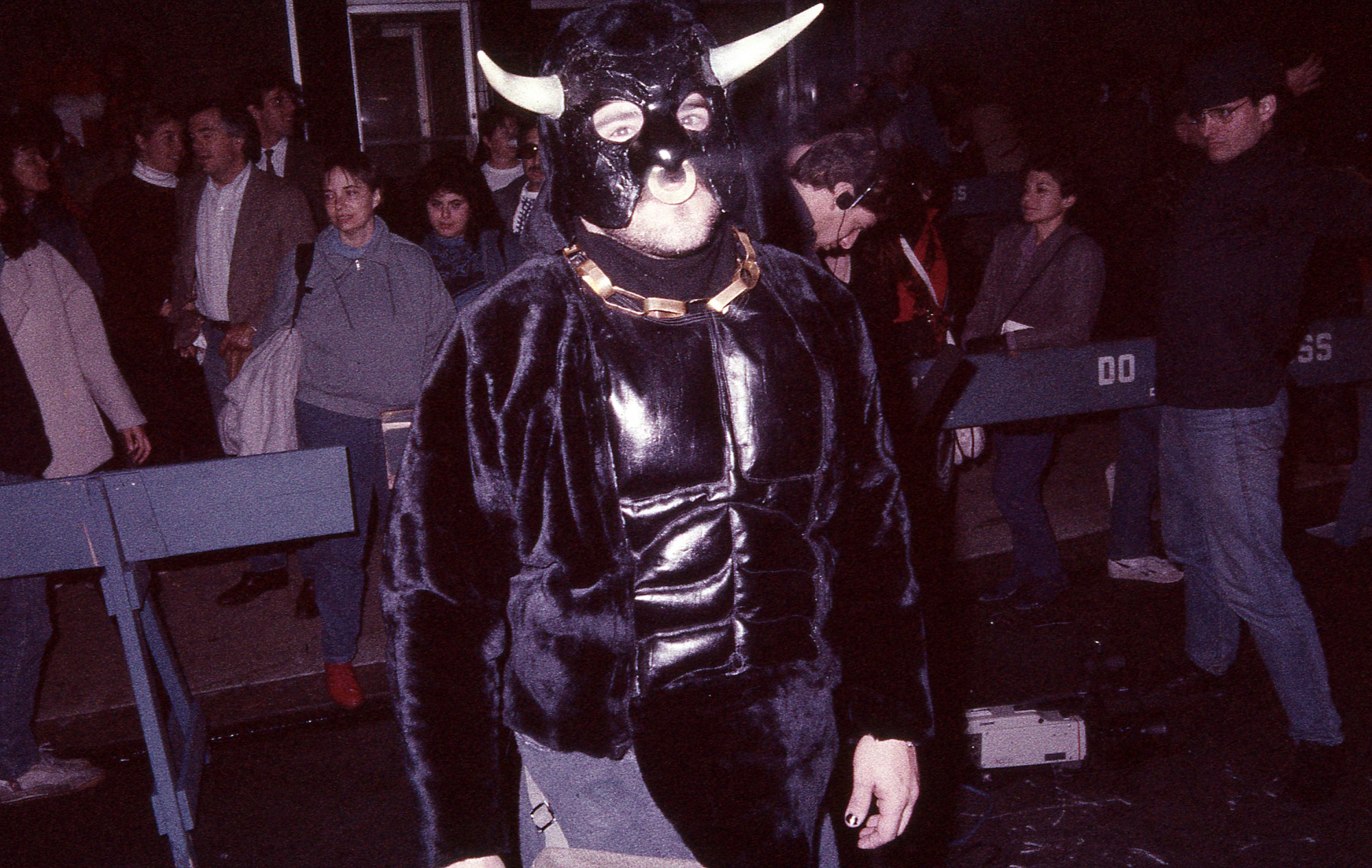 a man in a bull outfit and mask at greenwich village halloween parade