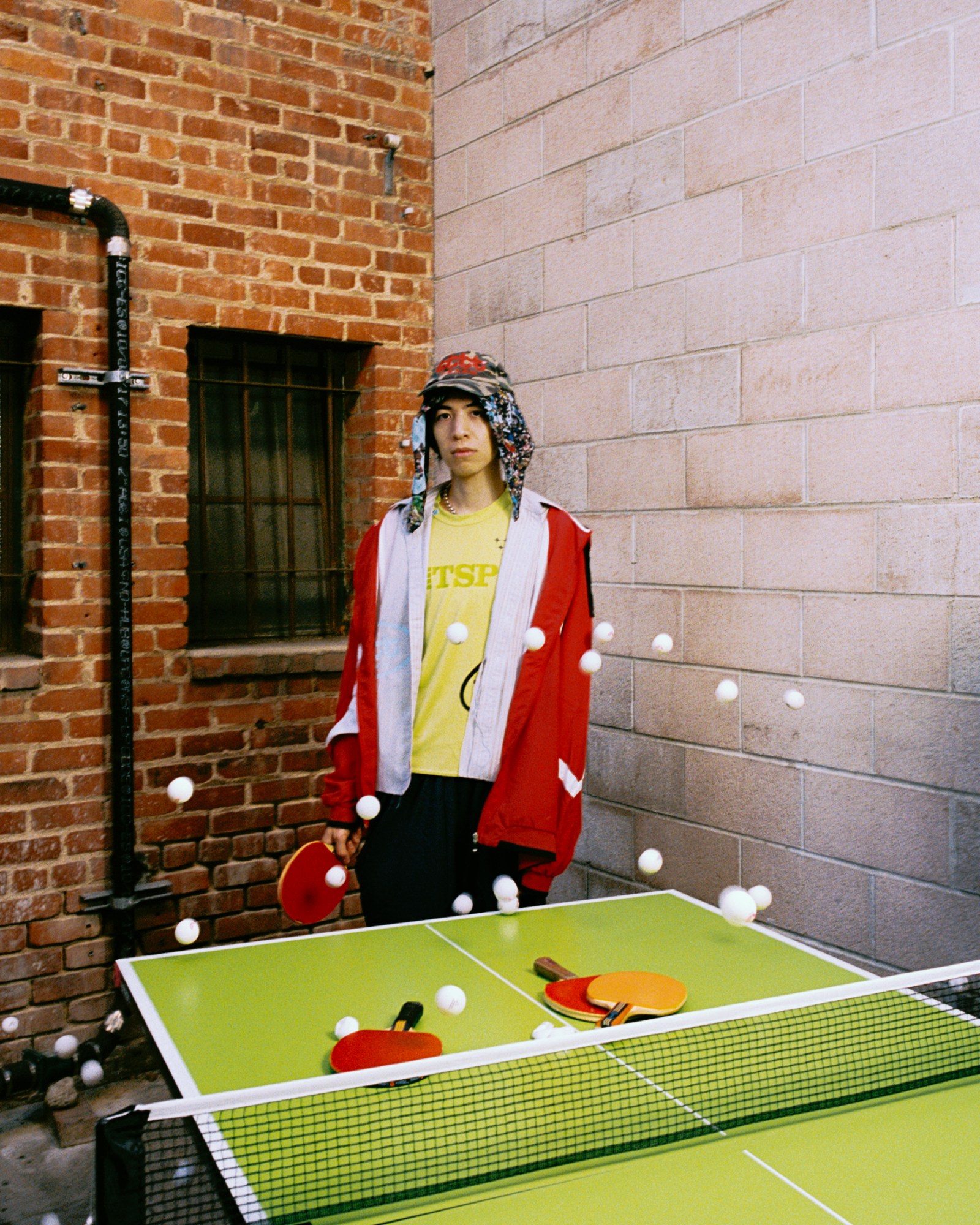 Adrian Tsou with ping-pong balls