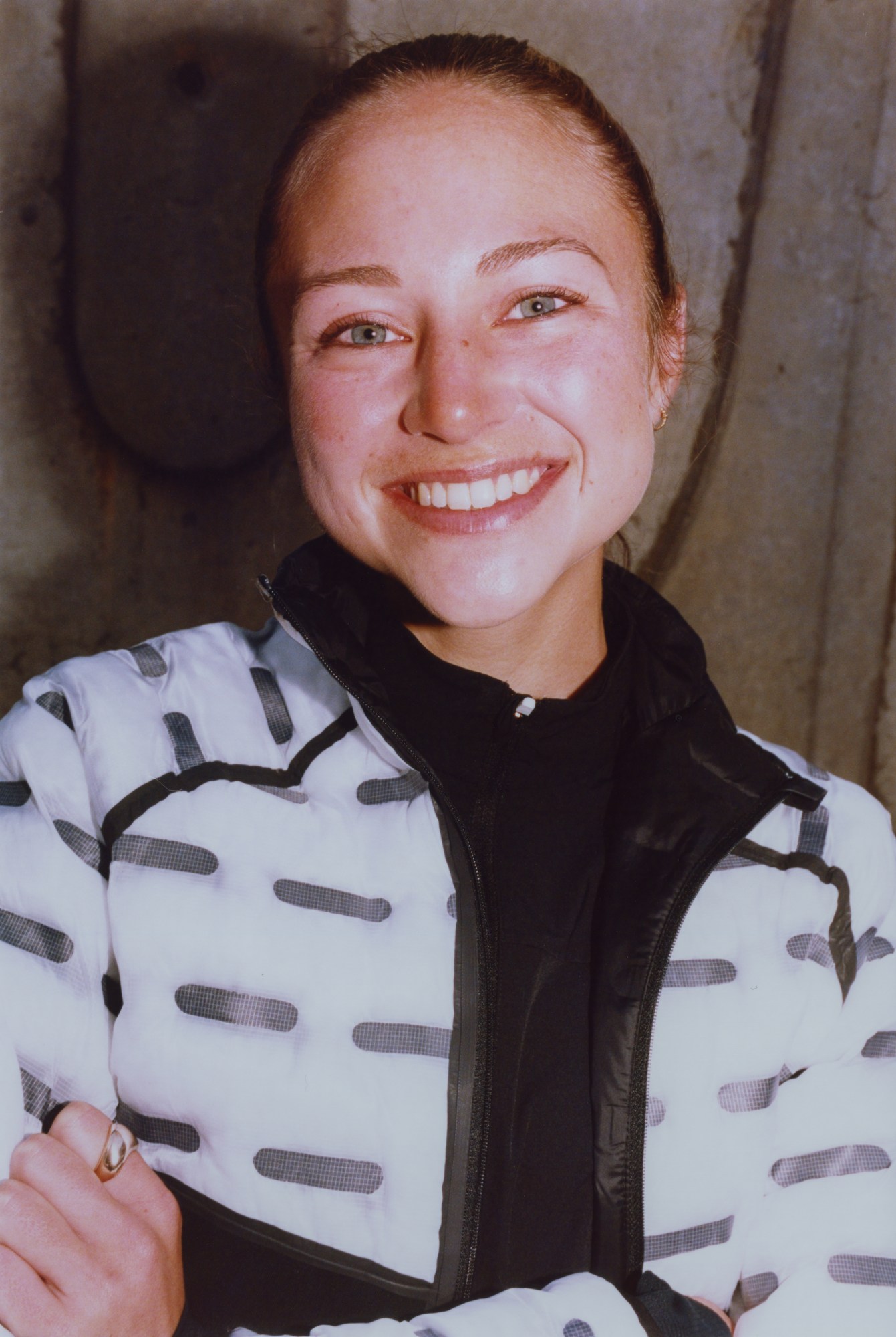 portrait of hannah steelman with her arms crossed