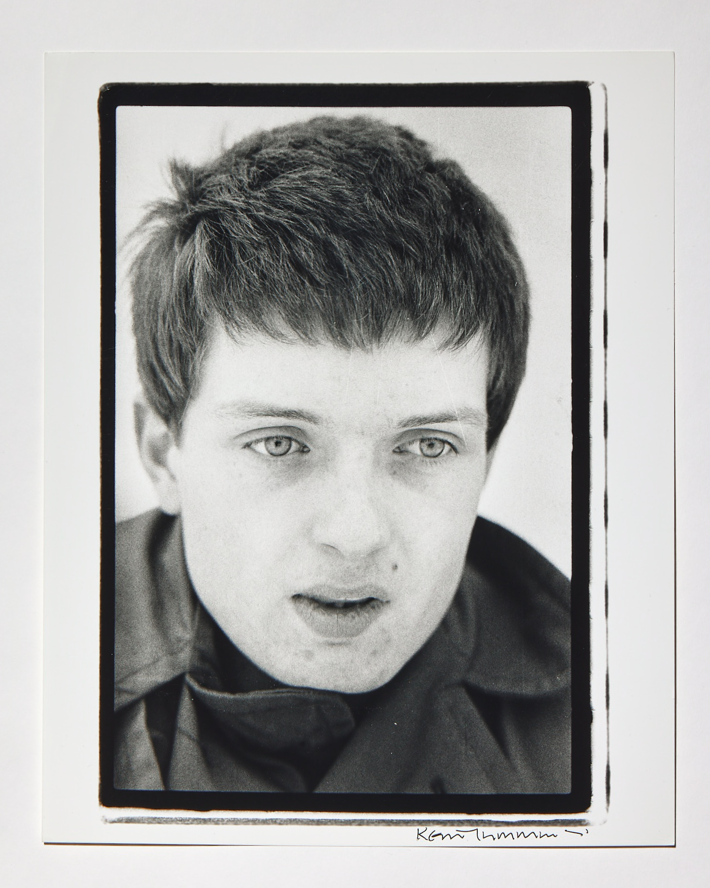 a black and white portrait of ian curtis of joy division by kevin cummins