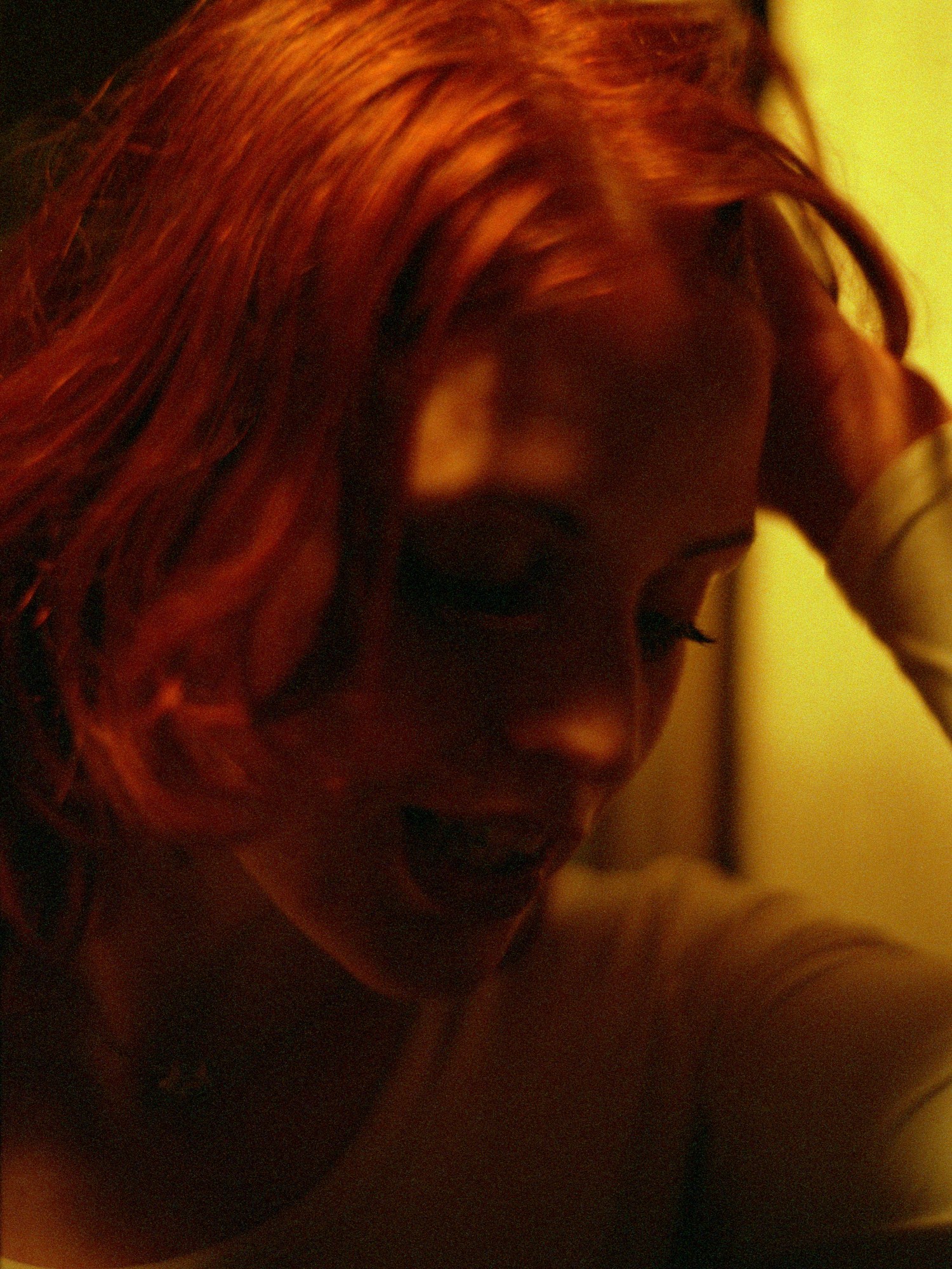 Photograph by Paul Graham of a girl in a nightclub in the 90s from the 1999 book End Of An Age, and featured in i-D’s The Royalty Issue, no. 370, Winter 2022