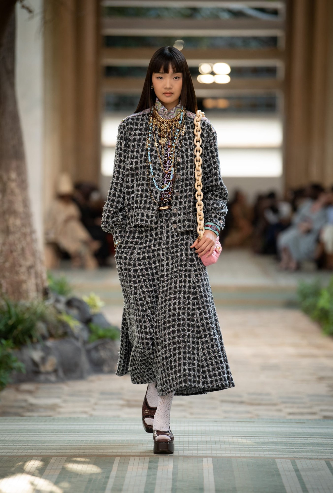 Model walking for Chanel pre-fall show 2023