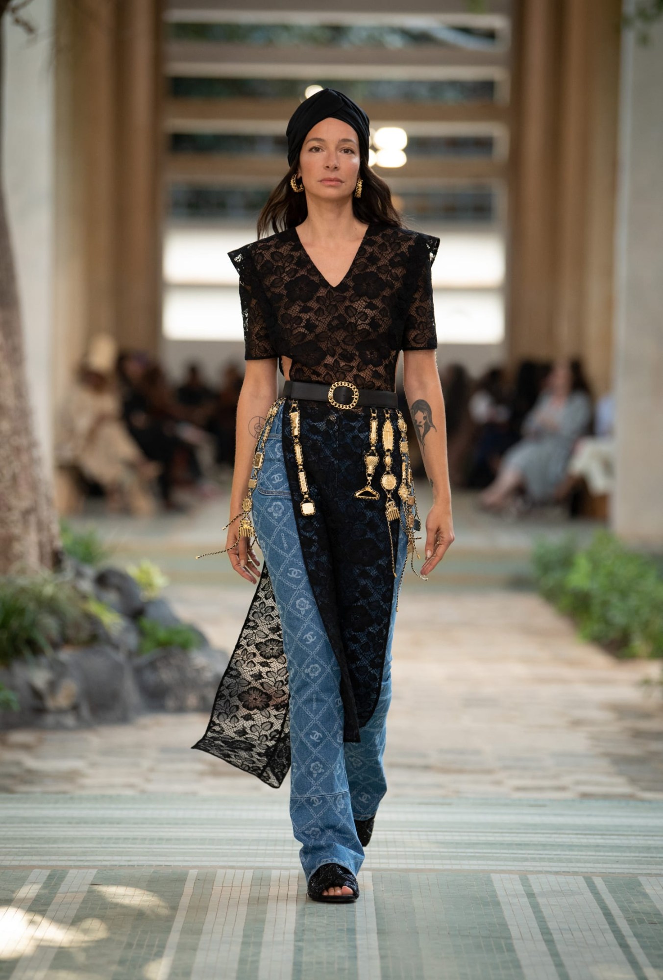 Model walking for Chanel pre-fall show 2023