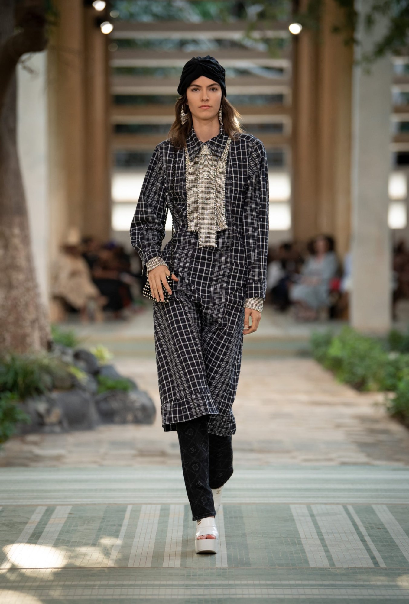 Model walking for Chanel pre-fall show 2023