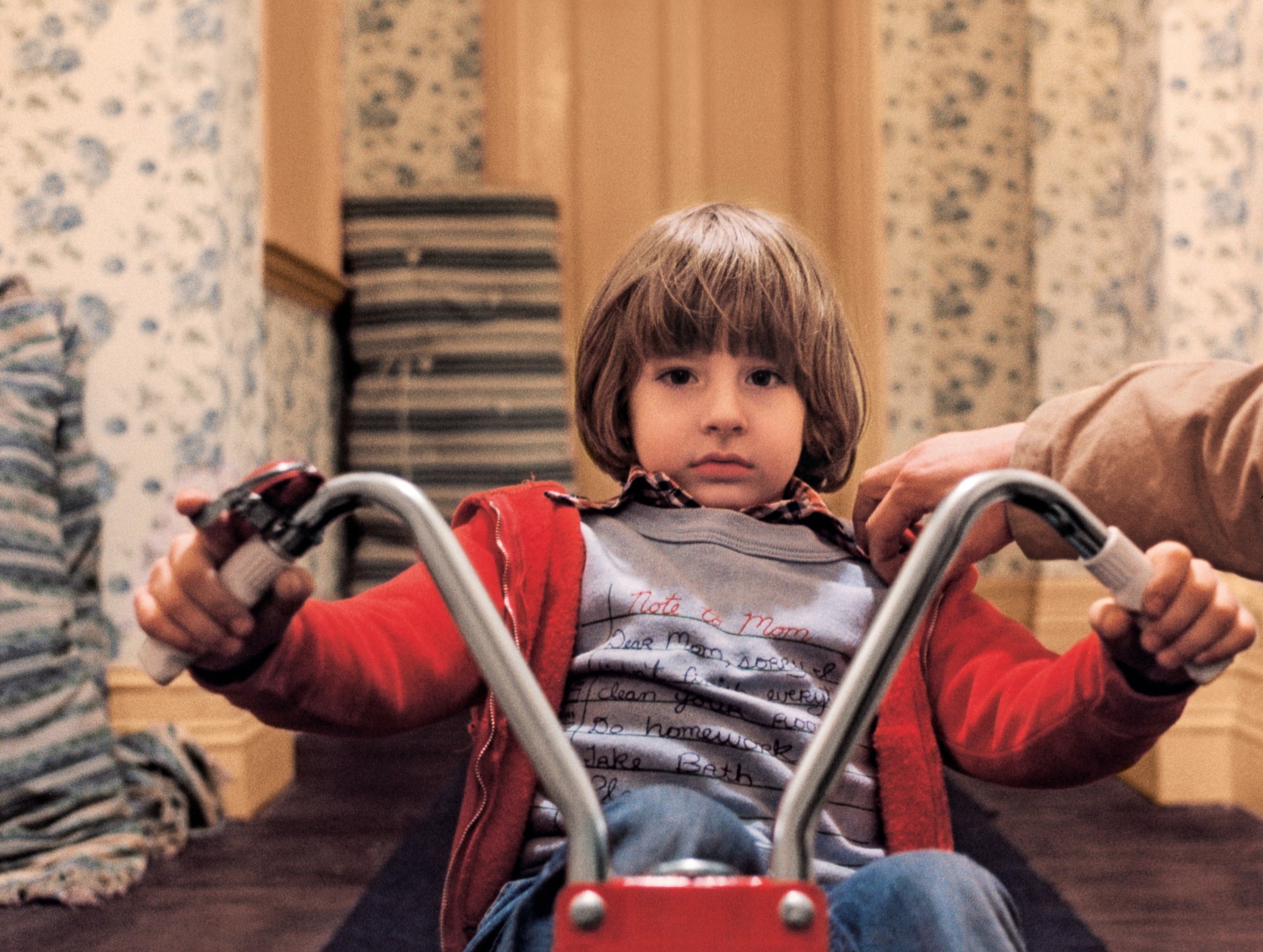 danny lloyd plays danny in the shining, on the tricycle