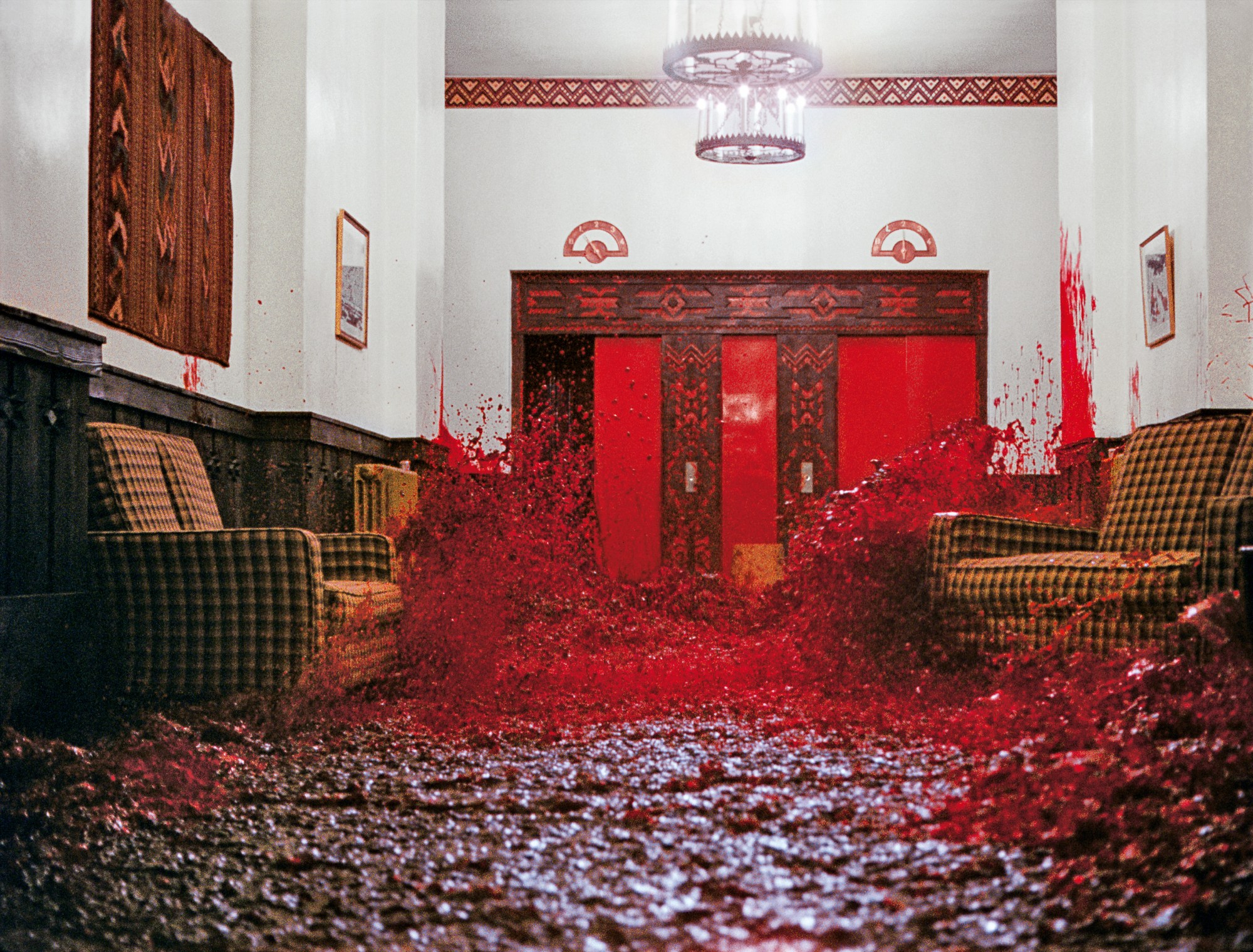 the blood pouring from the elevator in the shining