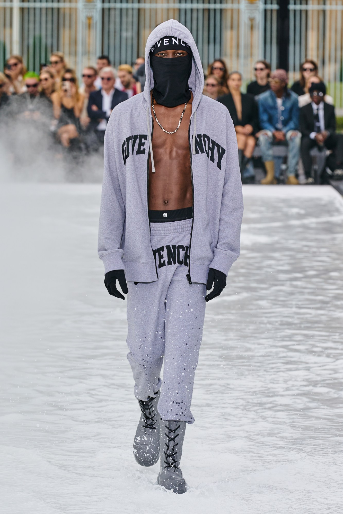 Model wearing grey sweatpants at the Givenchy SS23 show