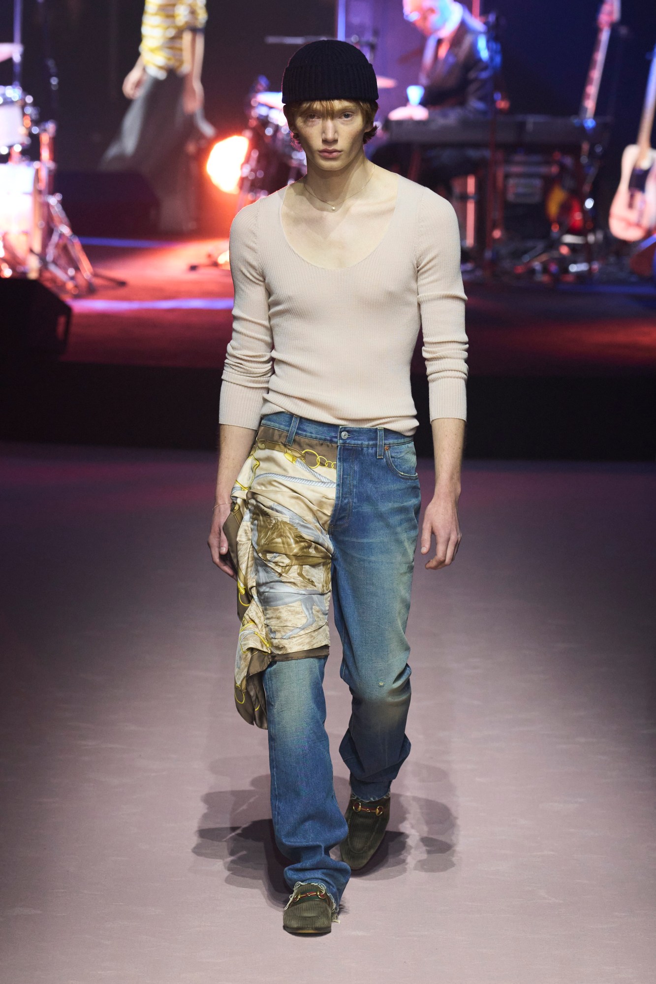 Model walking for Gucci at Milan Fashion Week Mens AW23