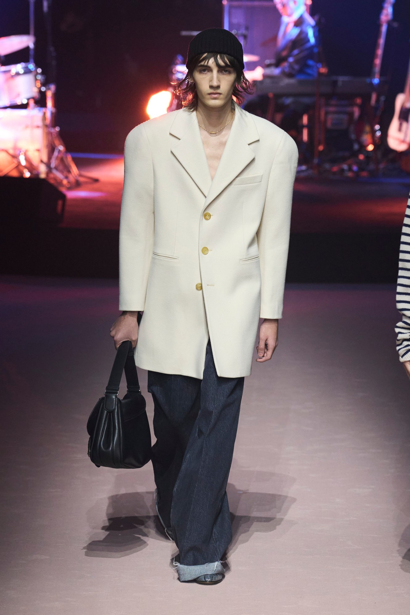 Model walking for Gucci at Milan Fashion Week Mens AW23