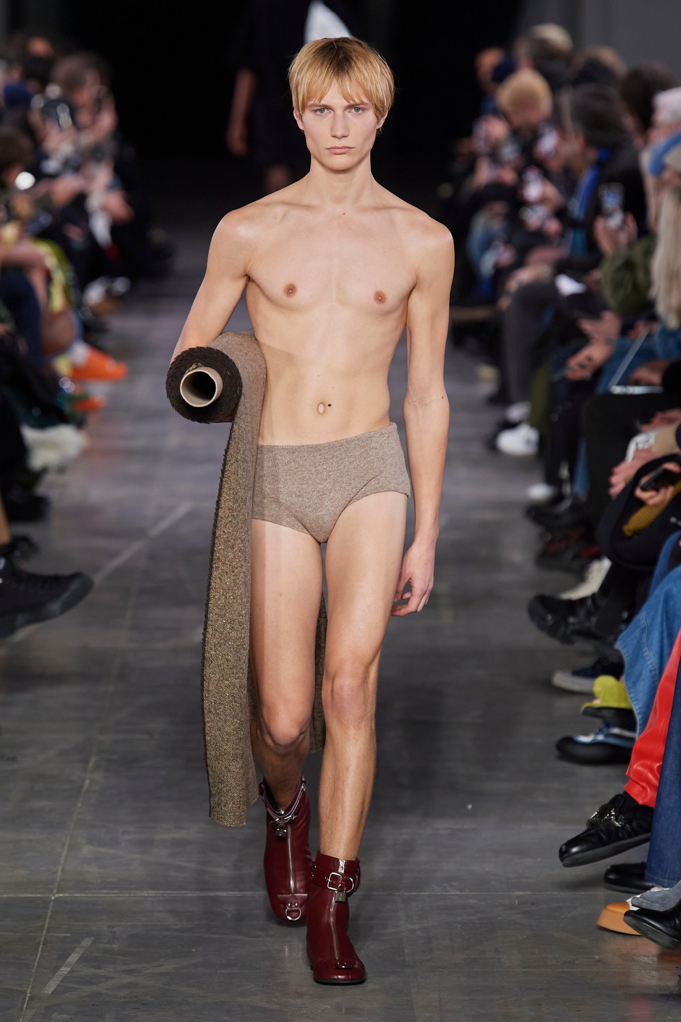 Model wearing JW Anderson on the runway at Milan Fashion Week Men's AW23