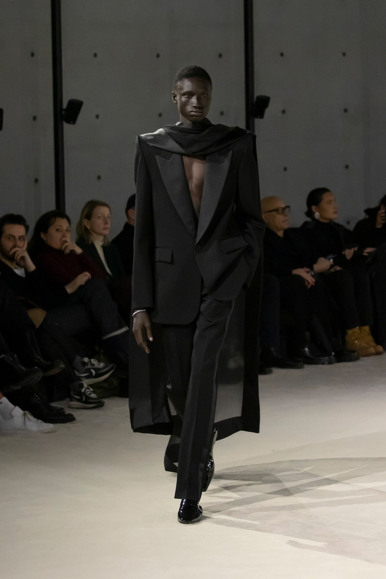 Model walking for Saint Laurent at Paris Fashion Week Men's AW23