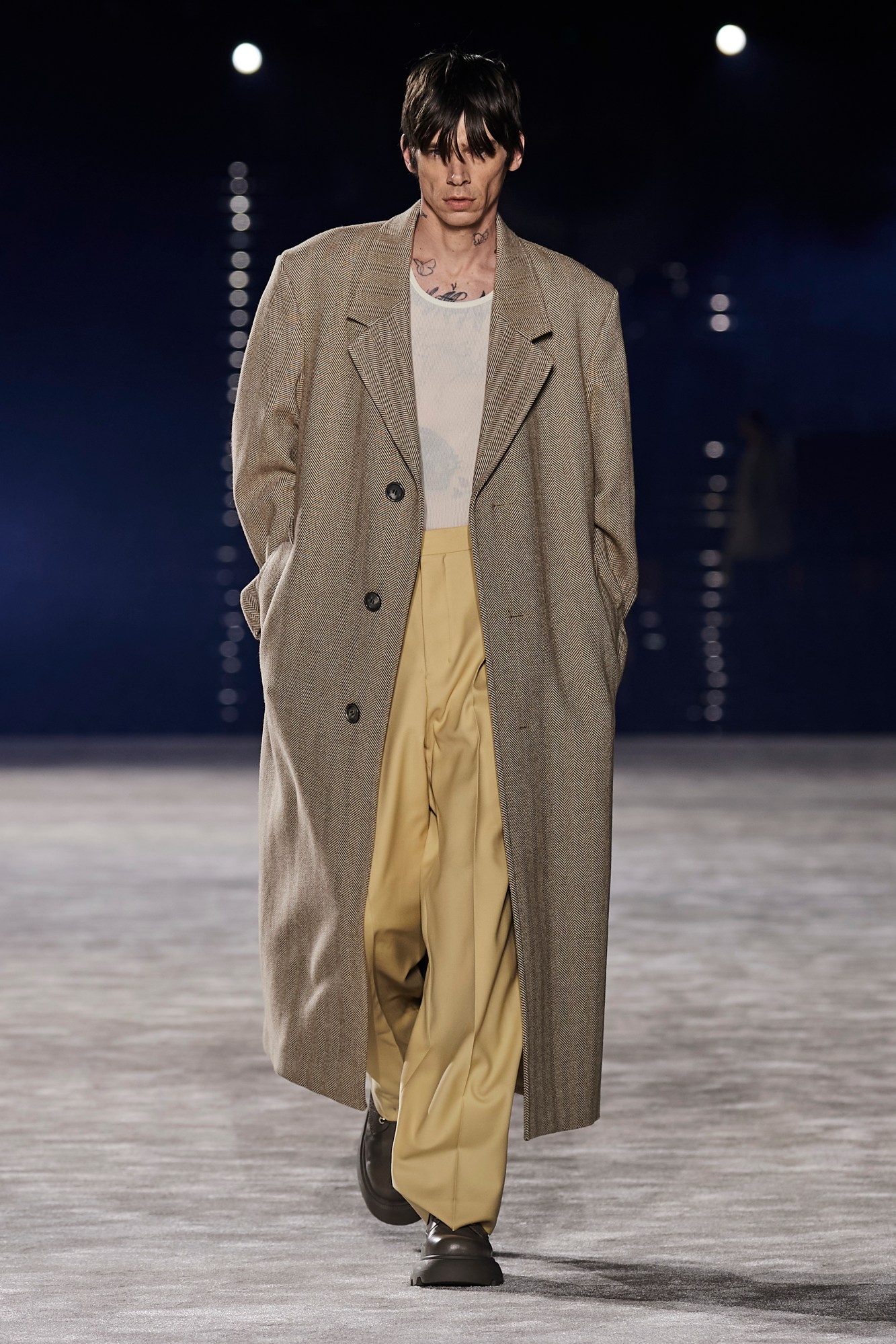 Model walking for Ami Men's AW23 at Paris Fashion Week Men's