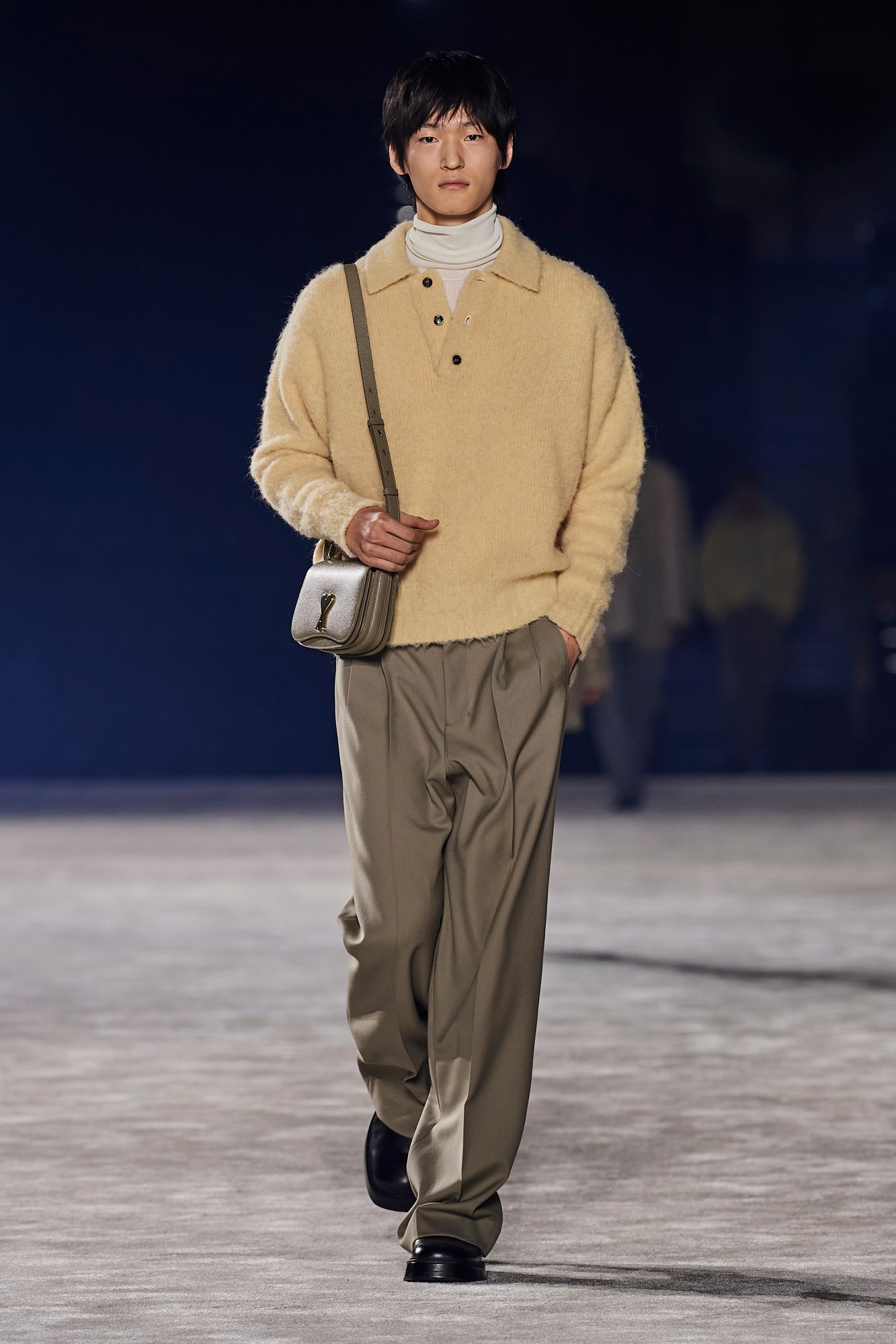 Model walking for Ami Men's AW23 at Paris Fashion Week Men's