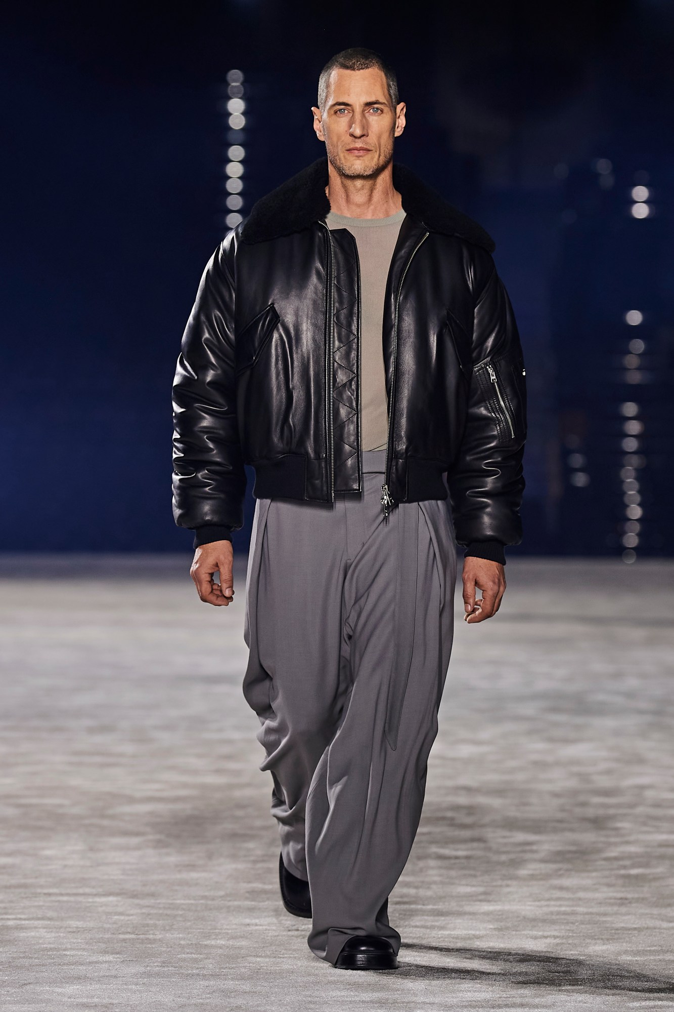 Model walking for Ami Men's AW23 at Paris Fashion Week Men's