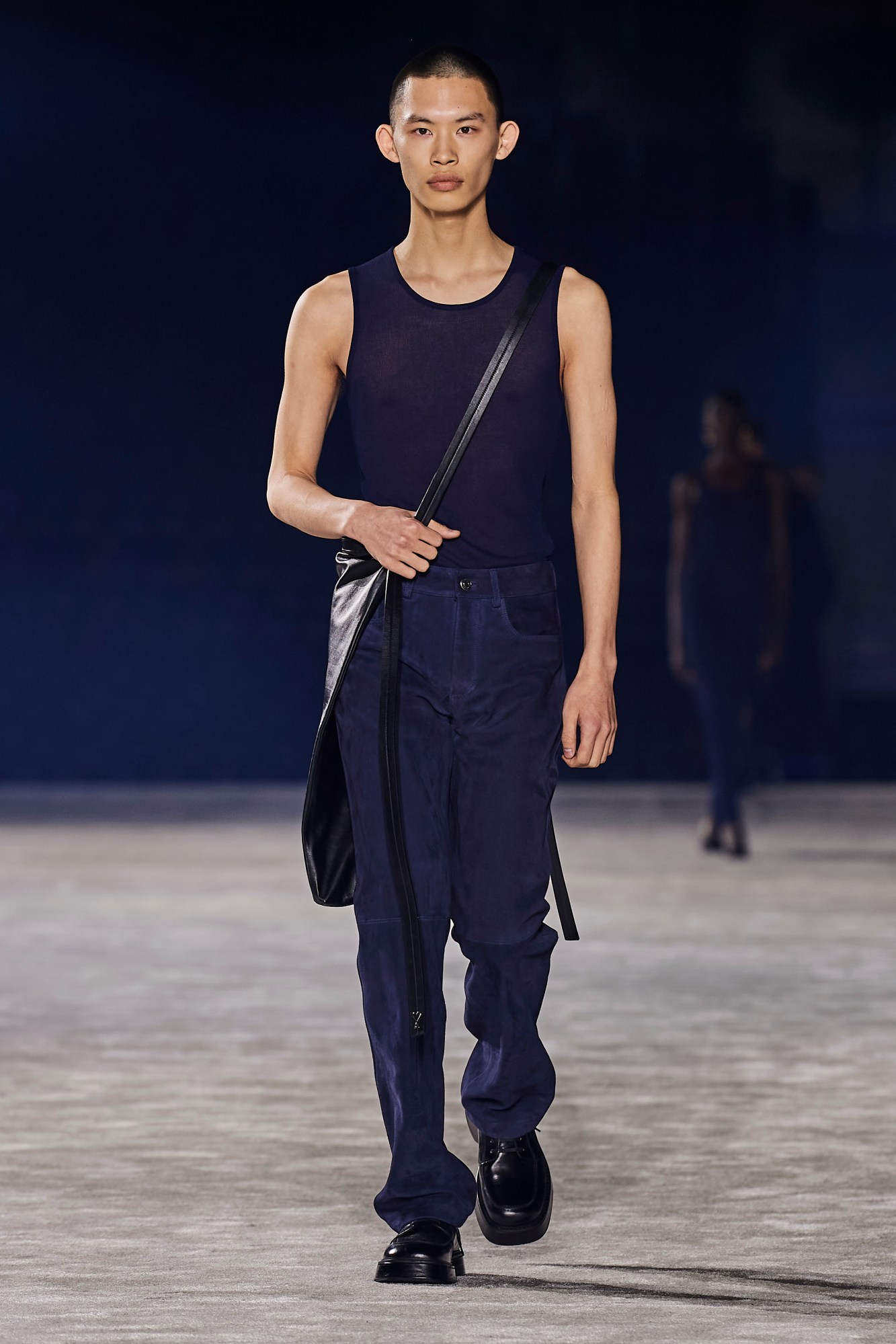 Model walking for Ami Men's AW23 at Paris Fashion Week Men's