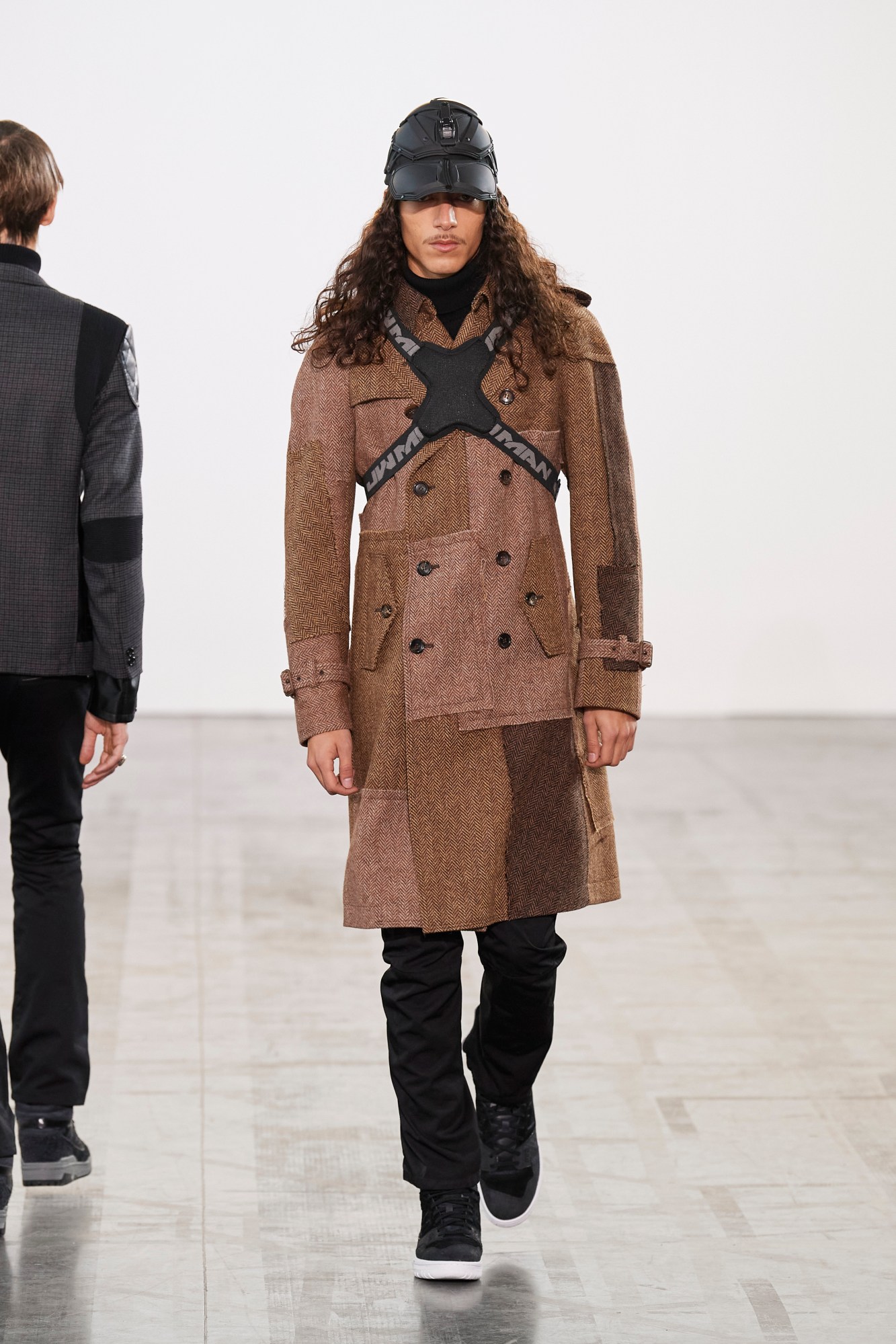 Model walking for Junya Watanabe at Paris Fashion Week Men's AW23