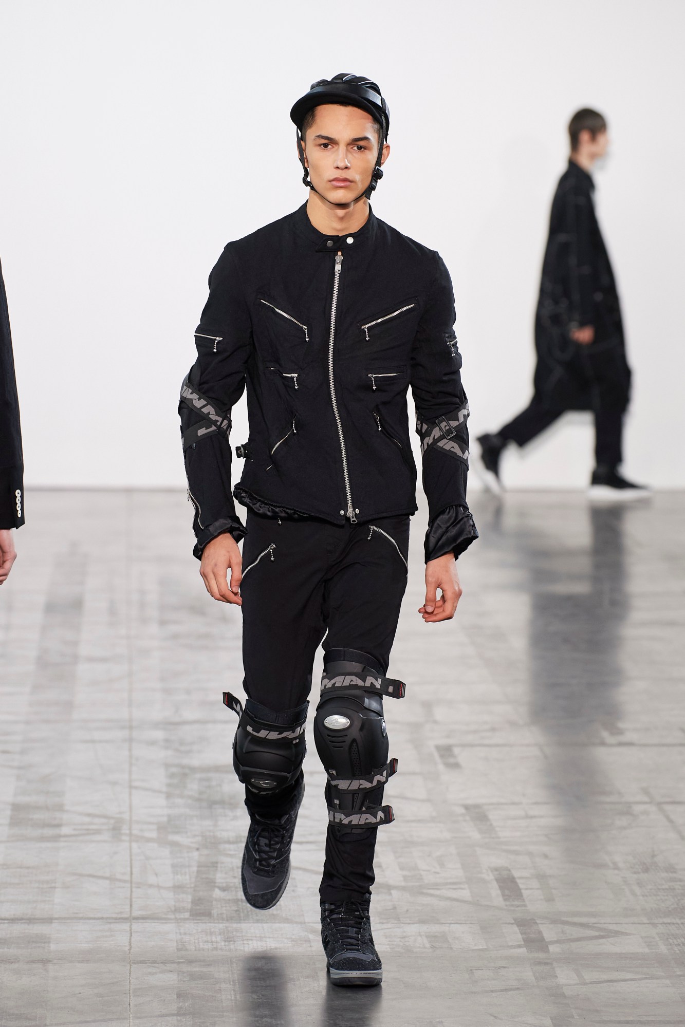 Model walking for Junya Watanabe at Paris Fashion Week Men's AW23