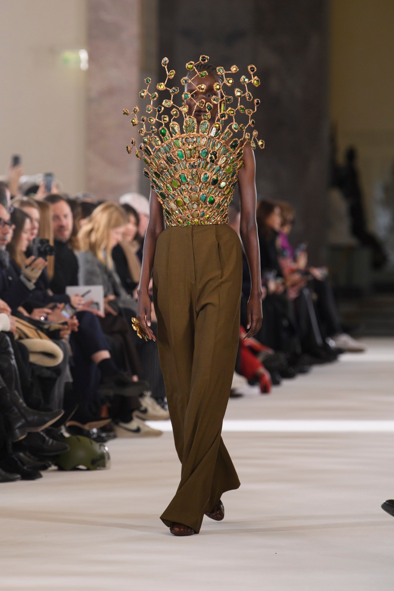 Model walking the Schiaparelli show at Haute Couture Week SS23