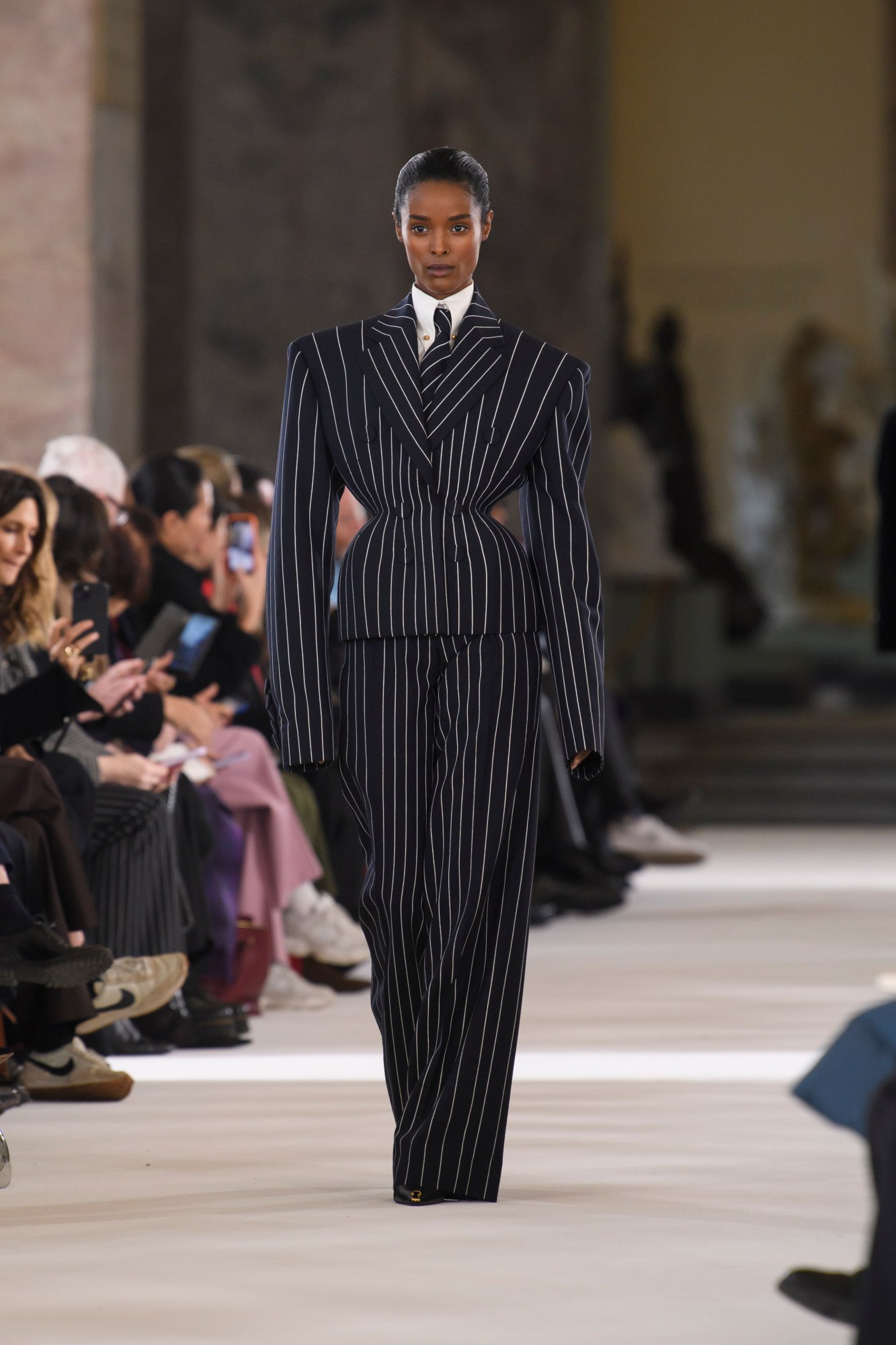 Model walking the Schiaparelli show at Haute Couture Week SS23