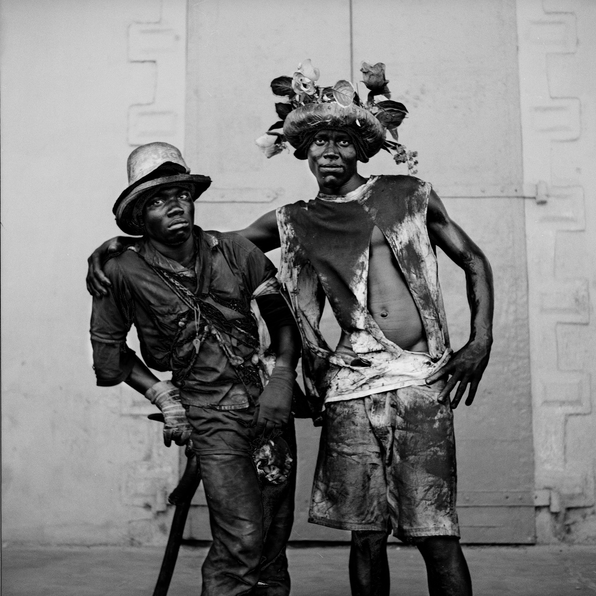 Two young men posing for a portrait at Haitian Kanaval.