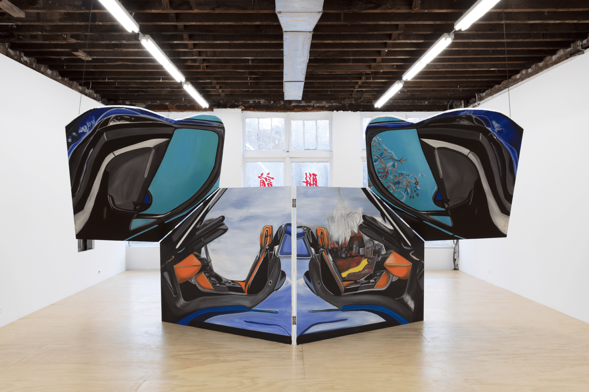 A large sculptural painting of a car with butterfly doors.