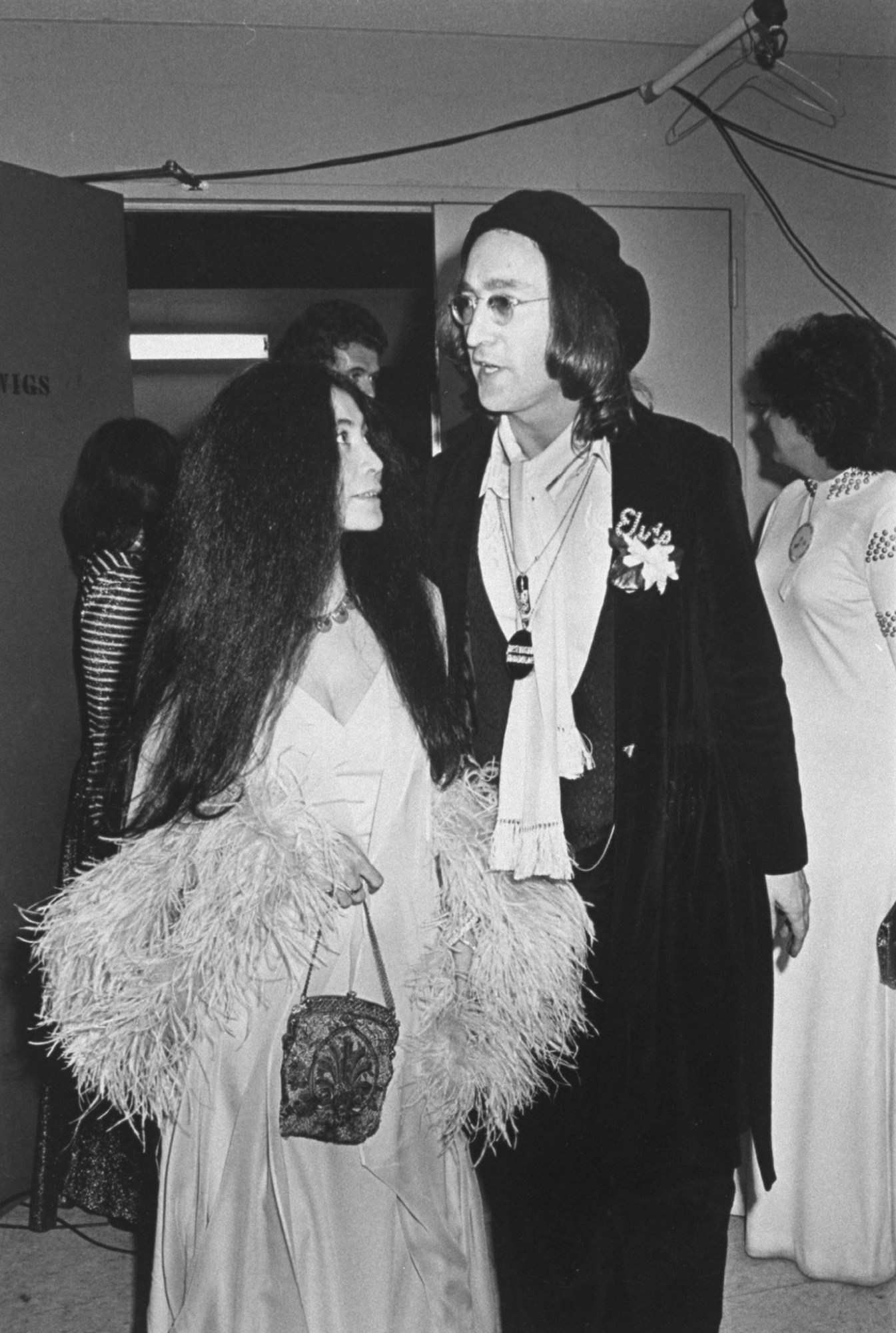 john lennon and yoko ono backstage at the grammy awards 1976