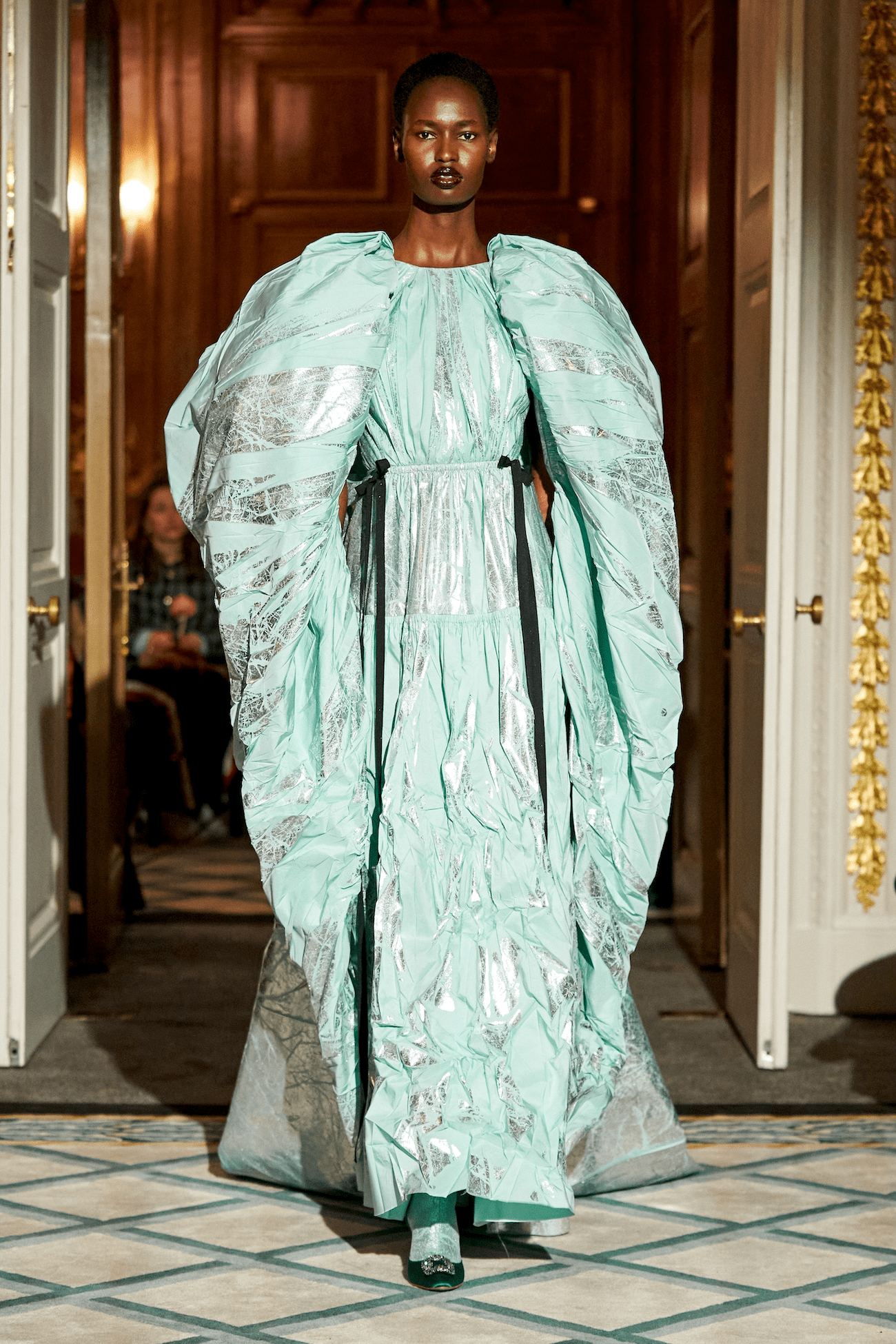 Model walking in a blue and silver gown at Roksanda AW23