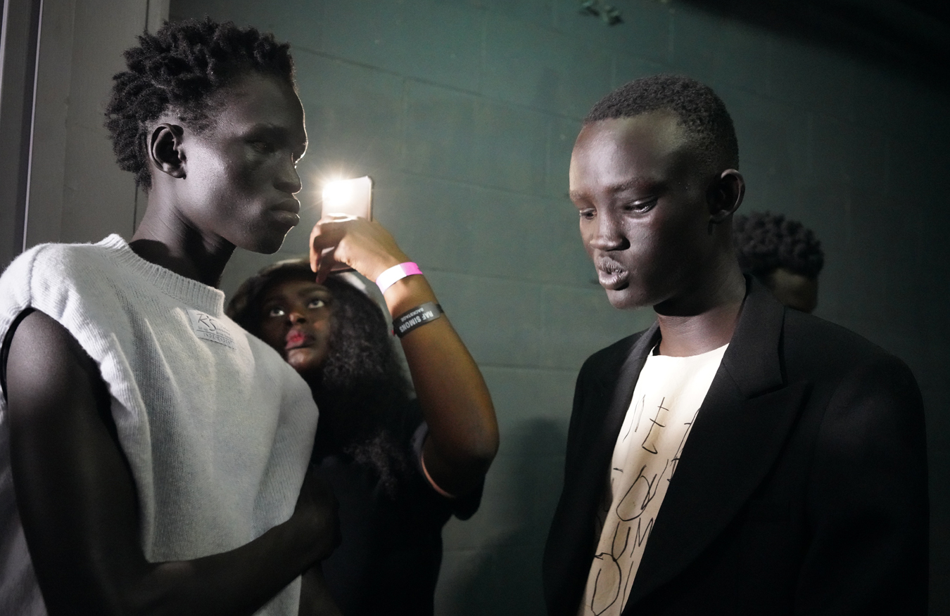 Photograph of models backstage at the Raf Simons SS23 show by Nick Waplington for i-D’s The Timeless Issue, no. 371, Spring 2023