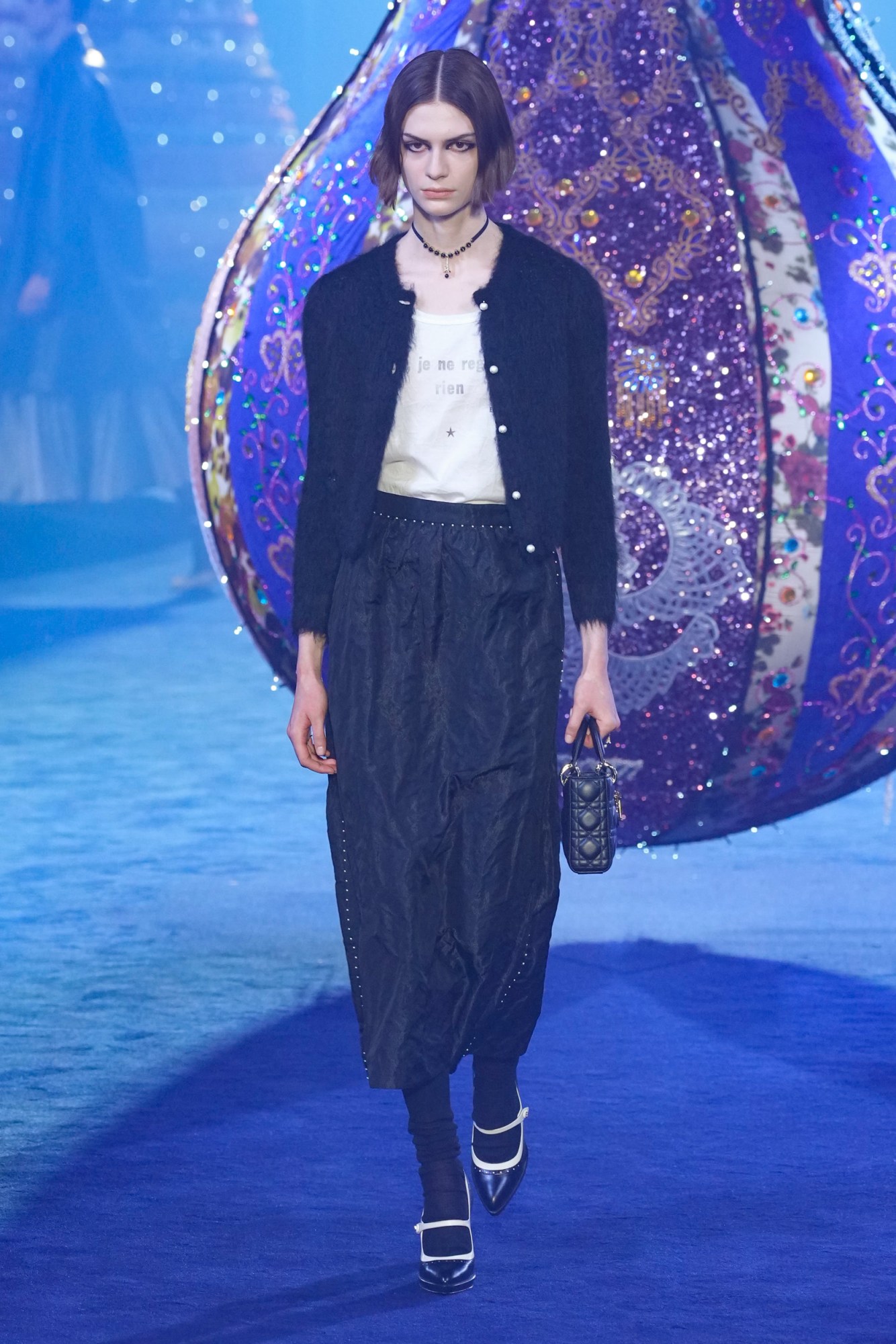 Model walking for Dior at Paris Fashion Week AW23