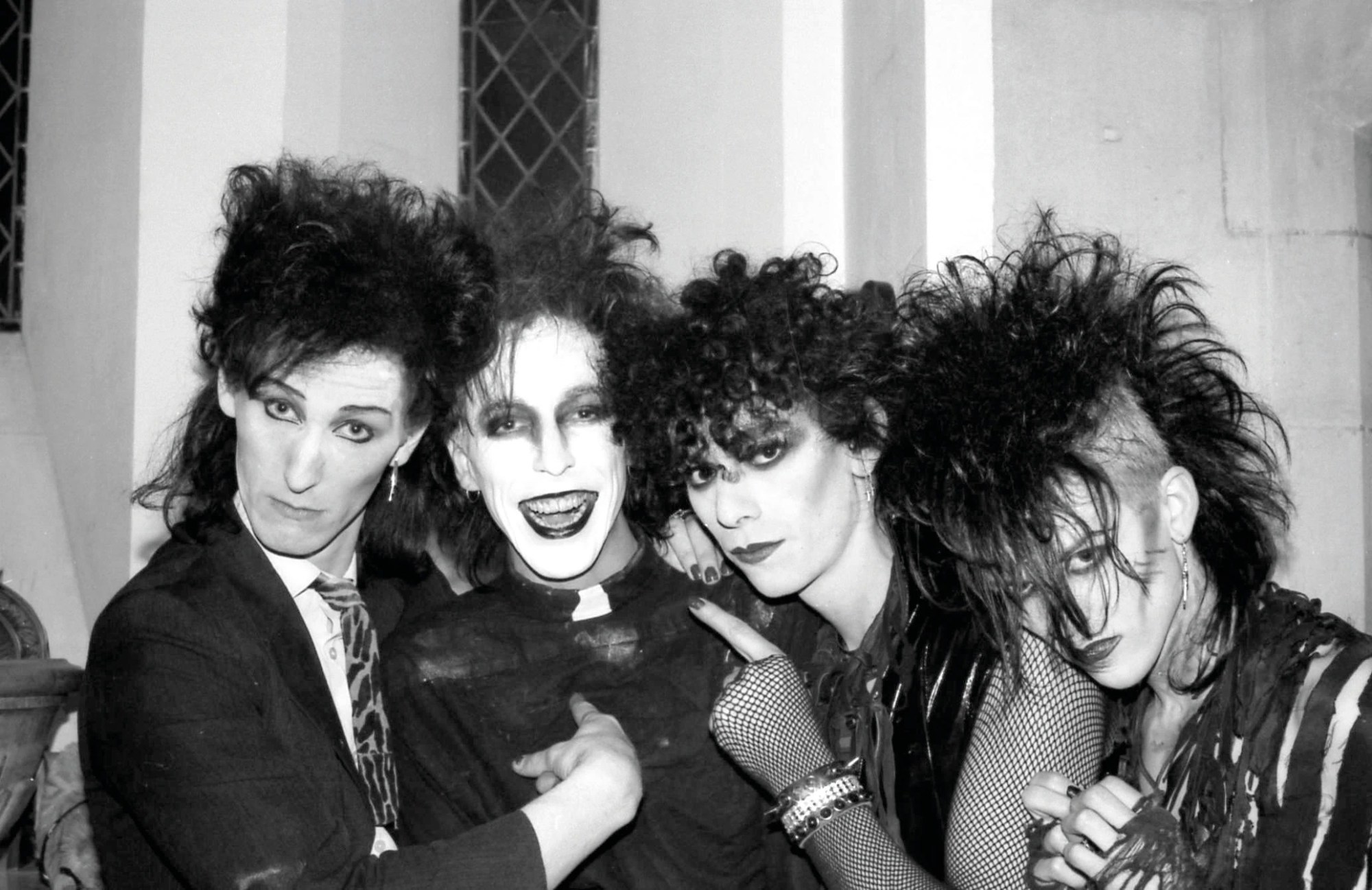 four goths with extravagent hair and makeup