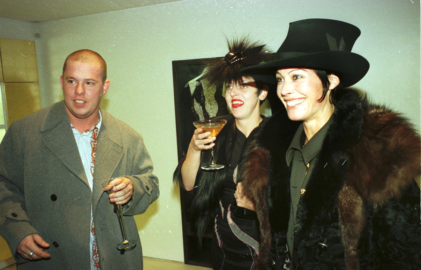 Alexander McQueen, Isabella Blow and Amanda Harlech with drinks at a Valentino store in London in 1996 as featured in the I-Con section of i-D’s The Timeless Issue, no. 371, Spring 2023