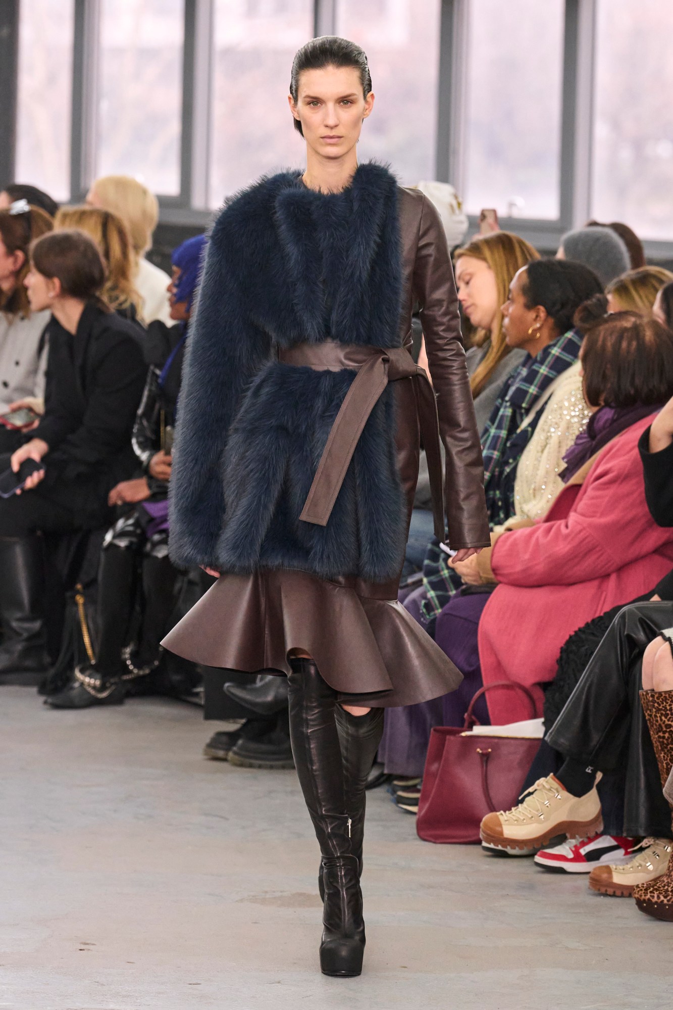 Model walking for the Sacai show at Paris Fashion Week AW23