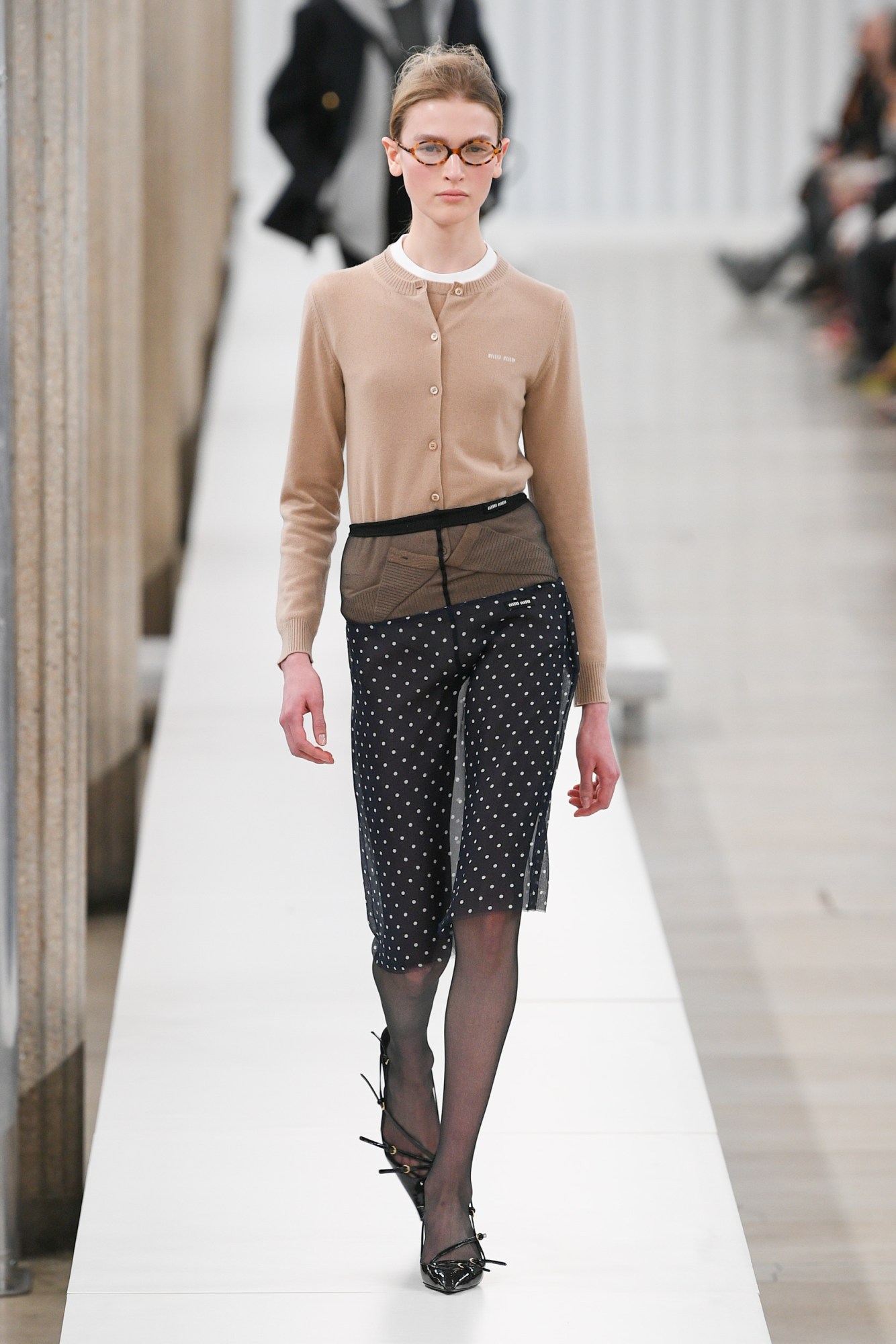 Model walking for the Miu Miu show at Paris Fashion Week AW23