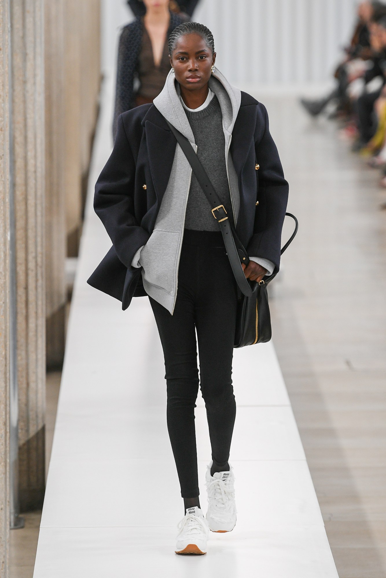 Model walking for the Miu Miu show at Paris Fashion Week AW23