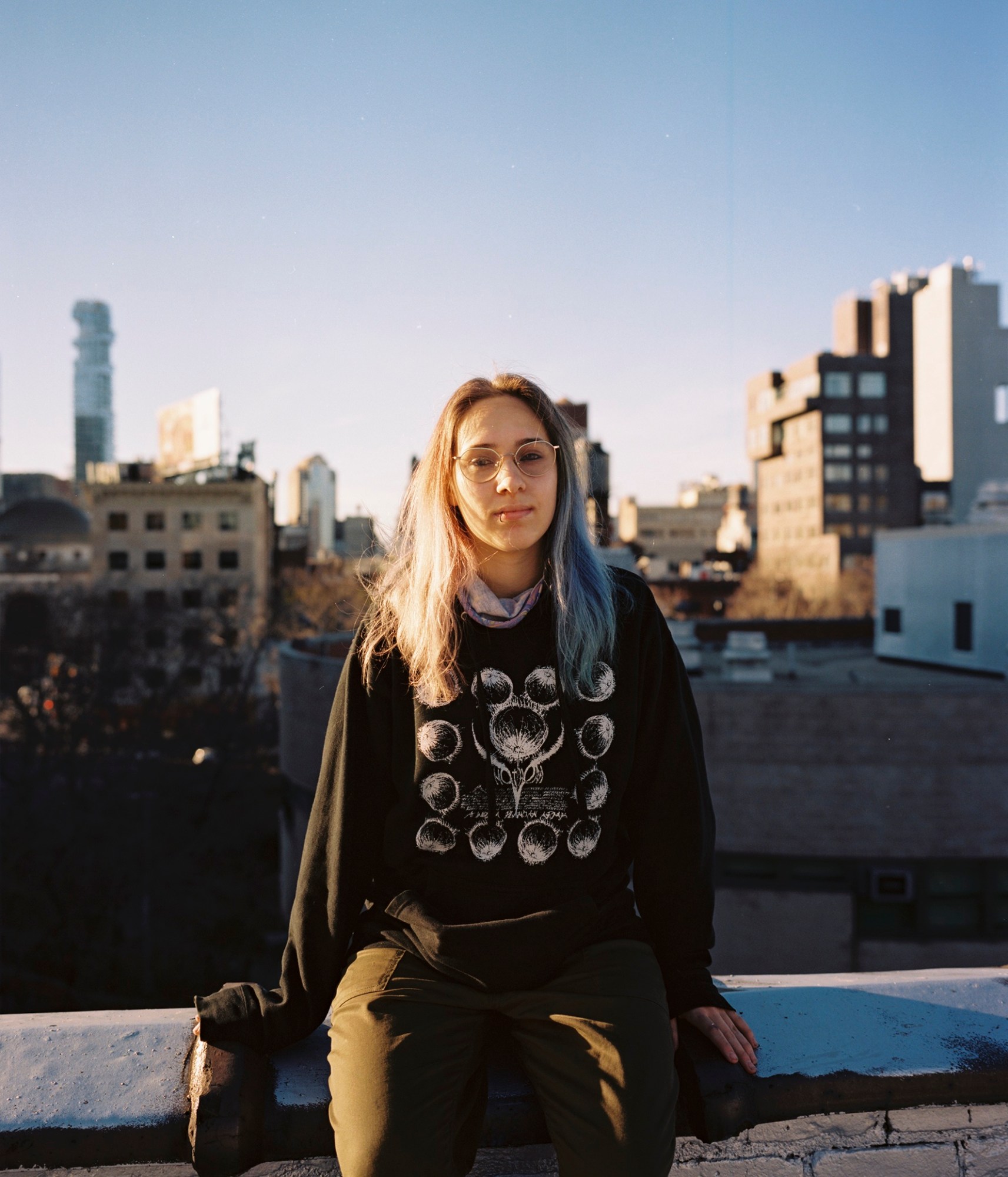 Levka-Starkova sitting on a new york rooftop