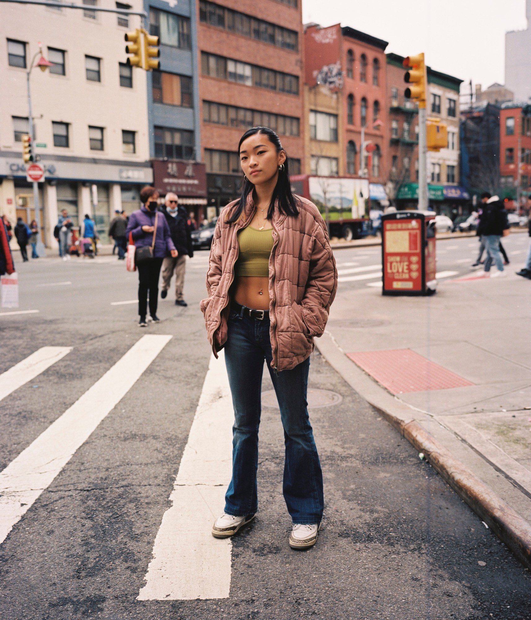 emma rehac standing in the crosswalk in chinatown