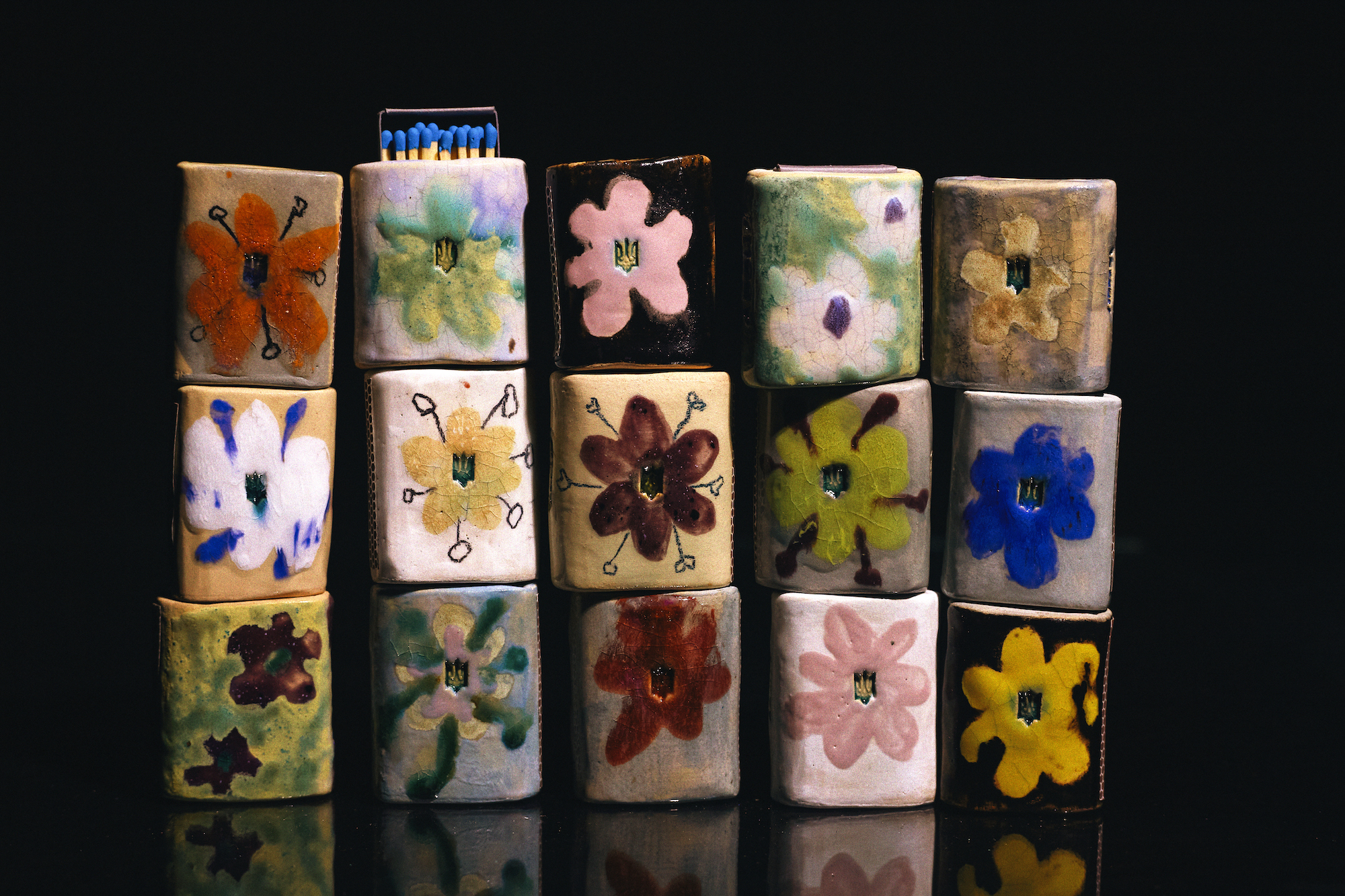 clay match boxes painted with flowers