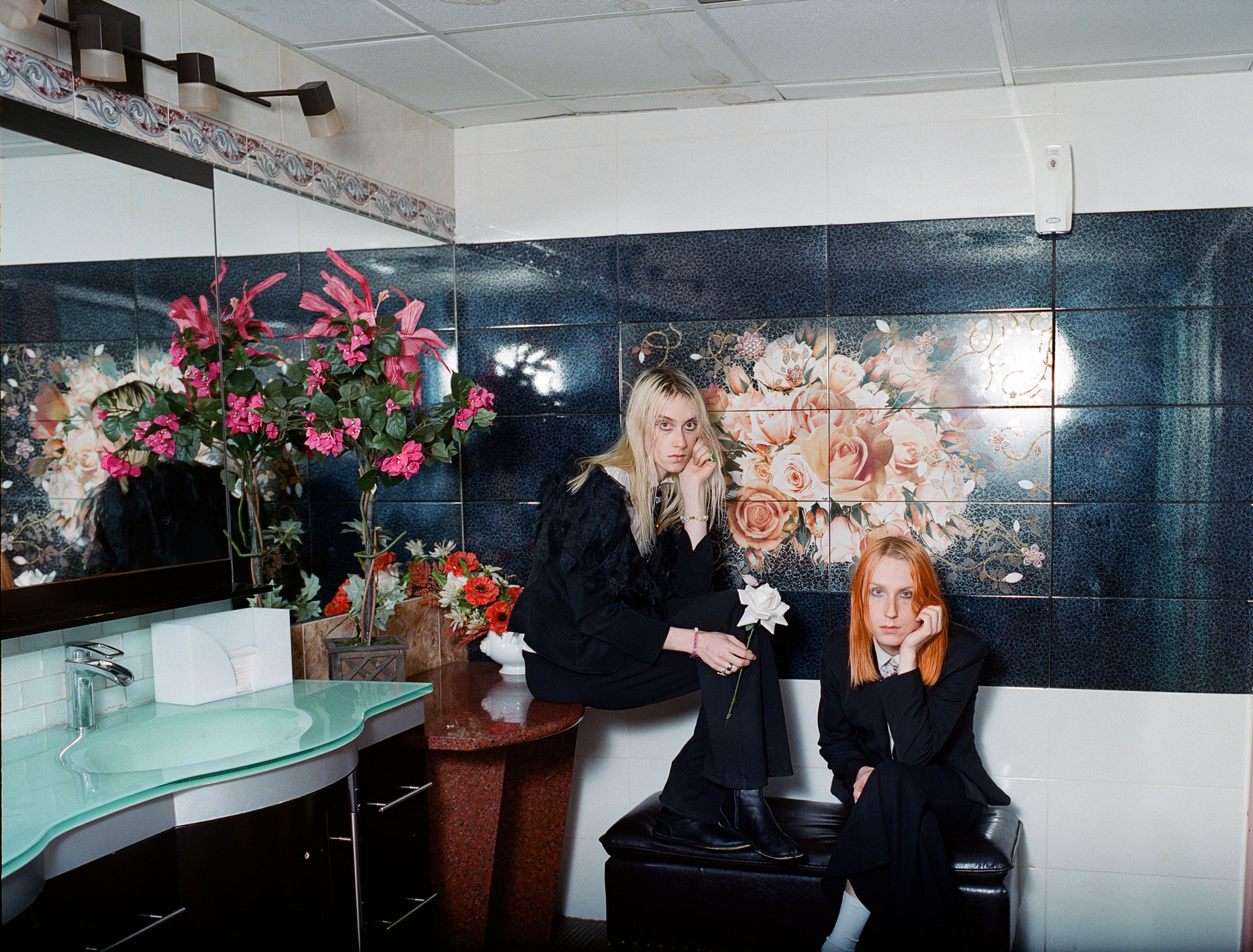 frost children sit in a chintzy bathroom of a coney island boardwalk restaurant