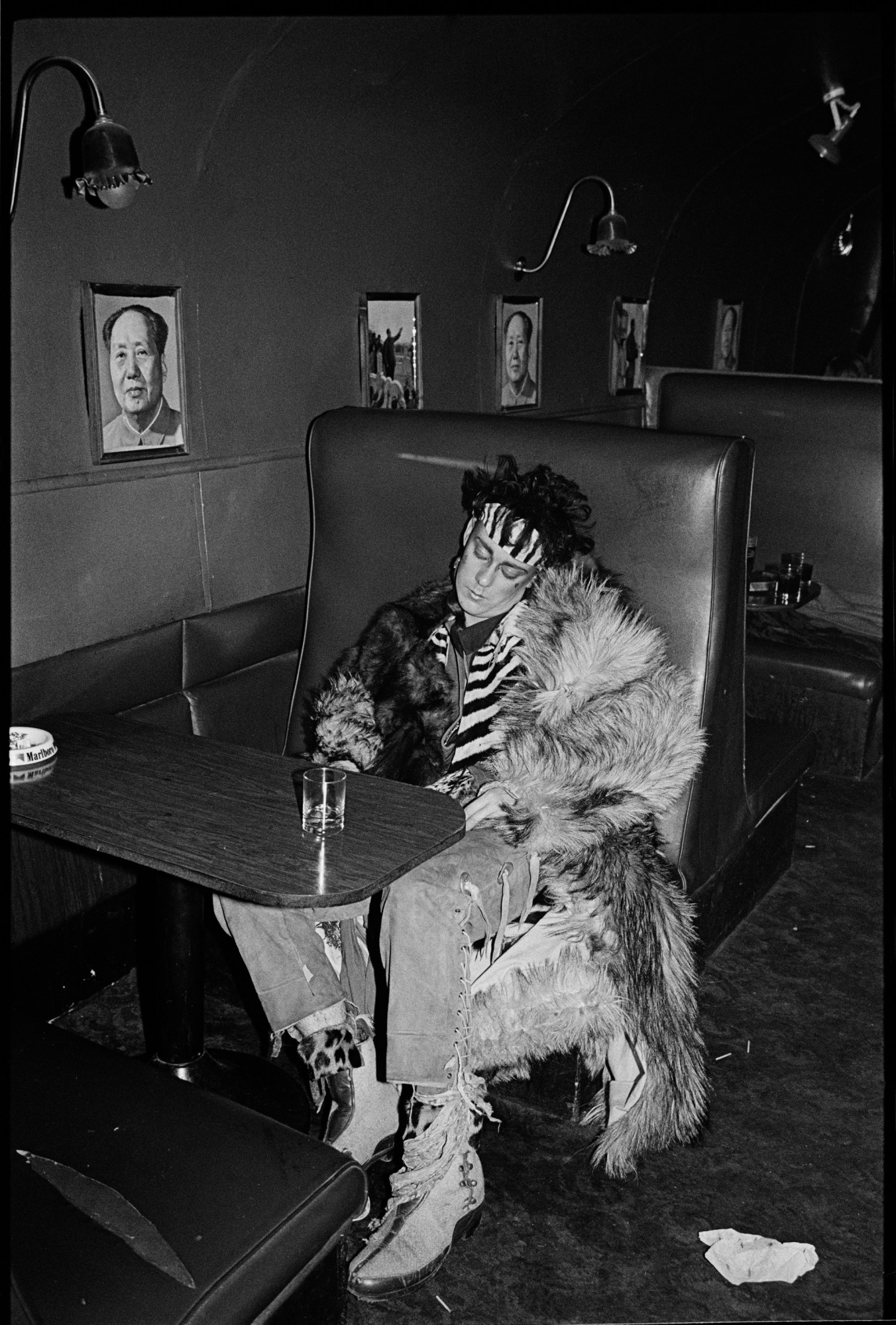 stephen linard sitting in a booth sleeping at the wall 1981