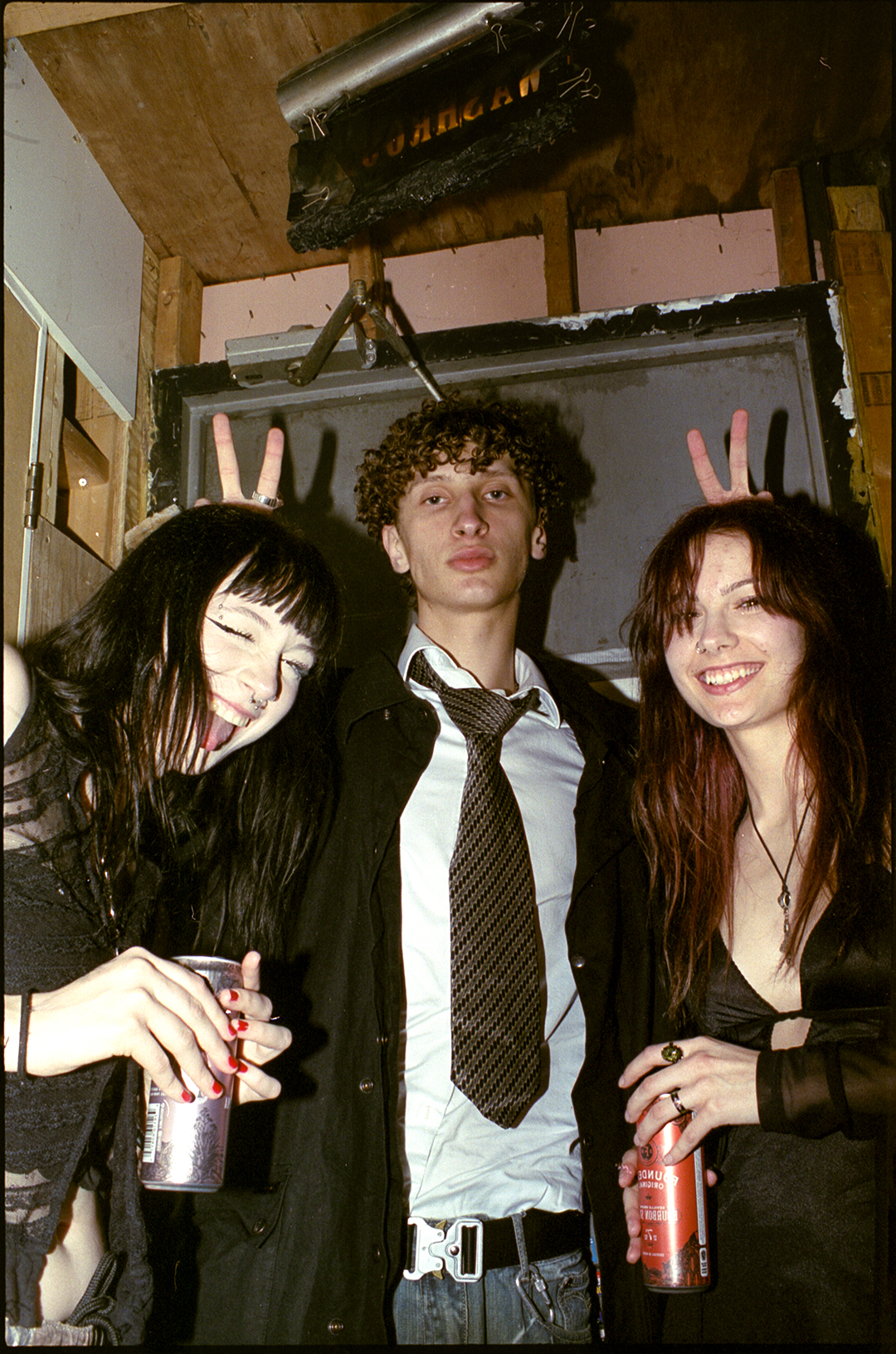 a group of ravers posing with drinks in toronto