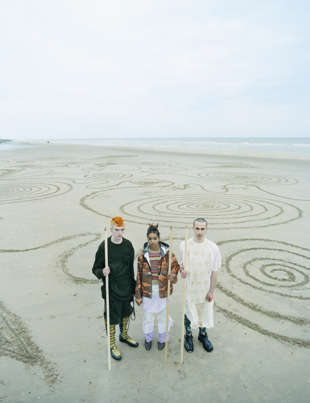 Finn Eastham, Raelle Fraser Cox and Saul Baraitser photographed by Oliver Hadlee Pearch on Camber Sands.