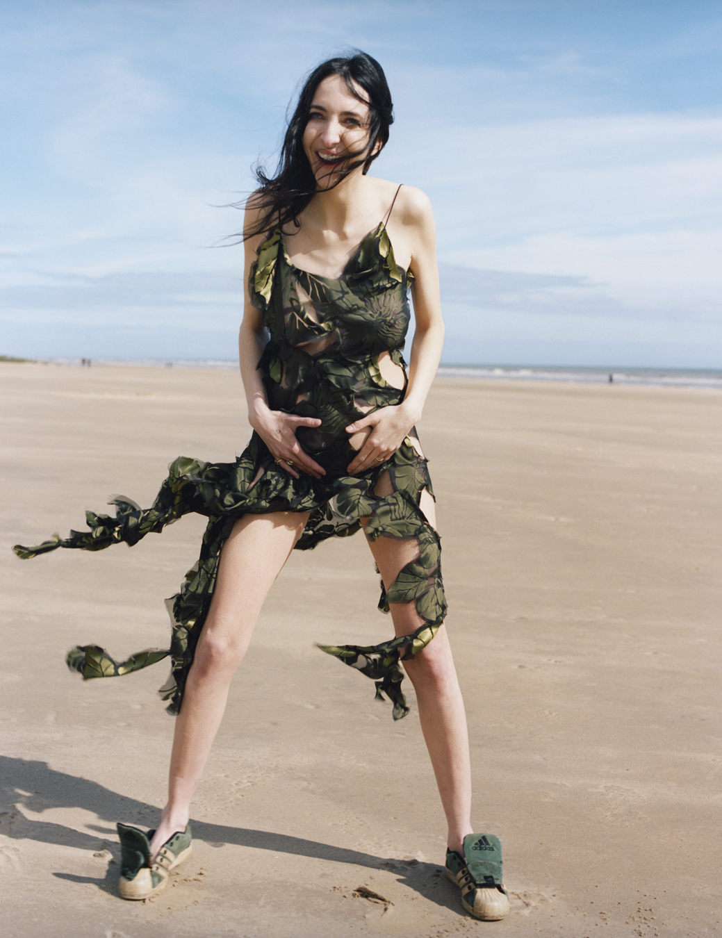 Editor Tish Weinstock photographed by Oliver Hadlee Pearch on Camber Sands.