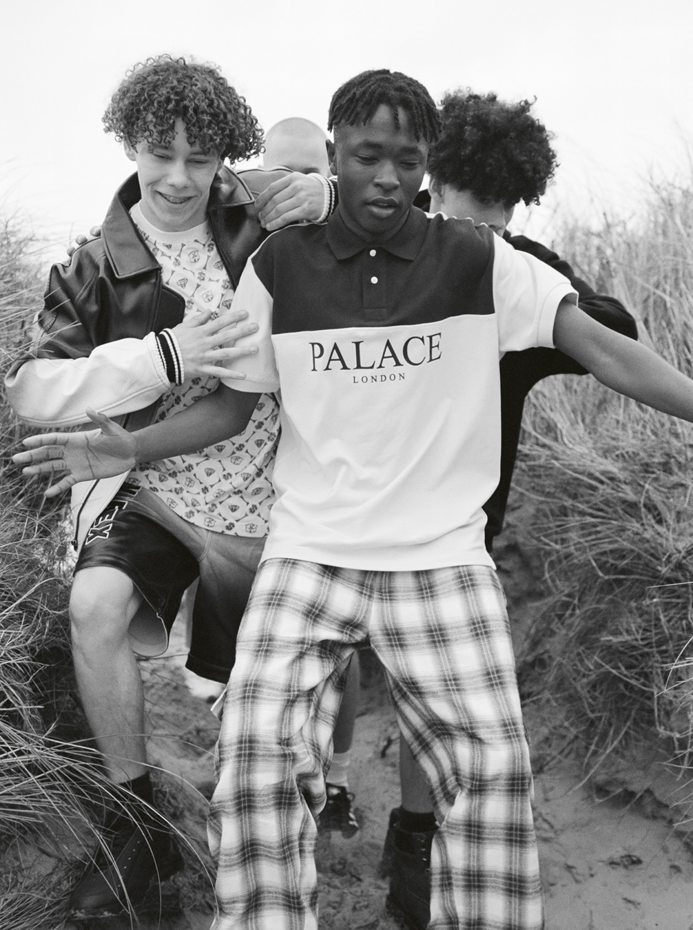 Students Denys Lysenko, Balla Shom, Jesu Guerra, Billy Cole photographed by Oliver Hadlee Pearch on Camber Sands.